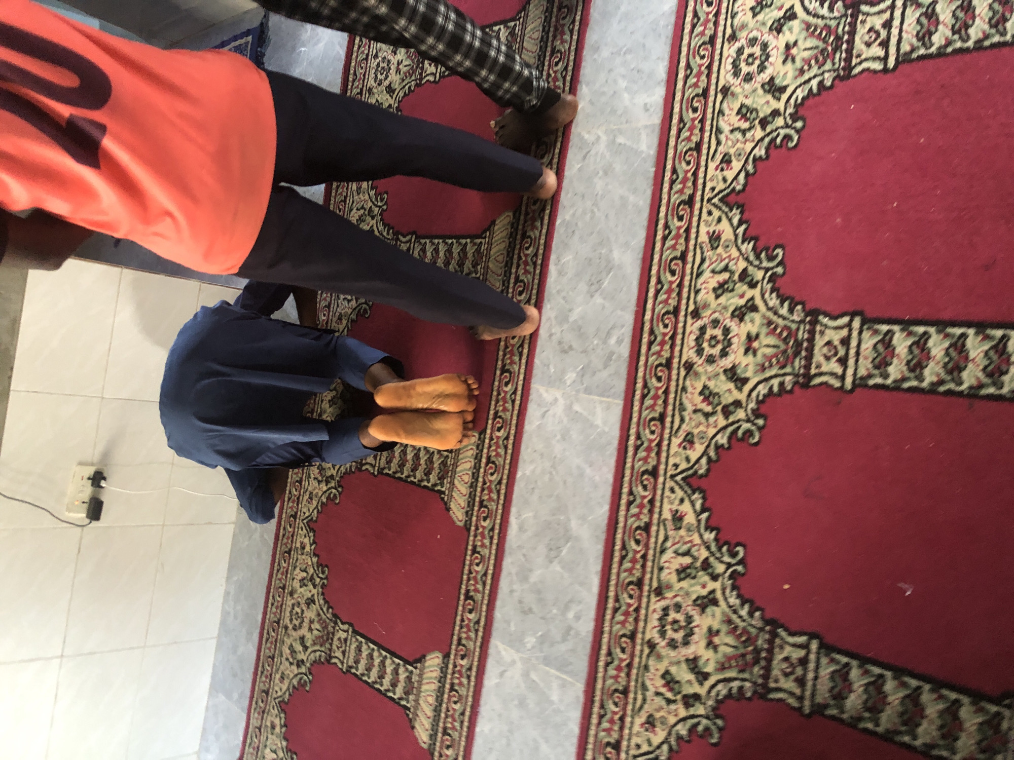 A day in Ado: prayers, street life, and a tailor's workshop