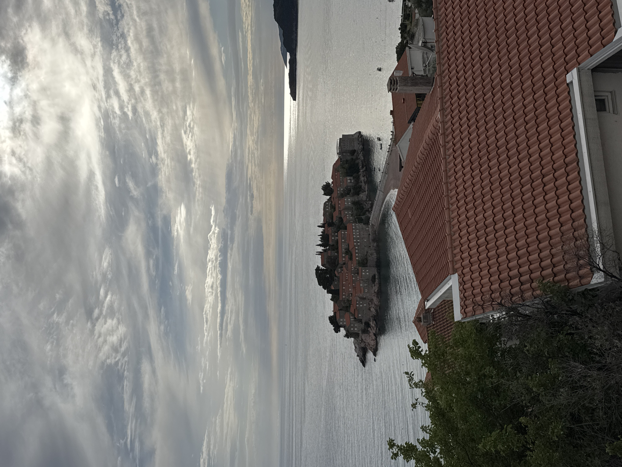 Tourist captures scenic views of Sveti Stefan island village