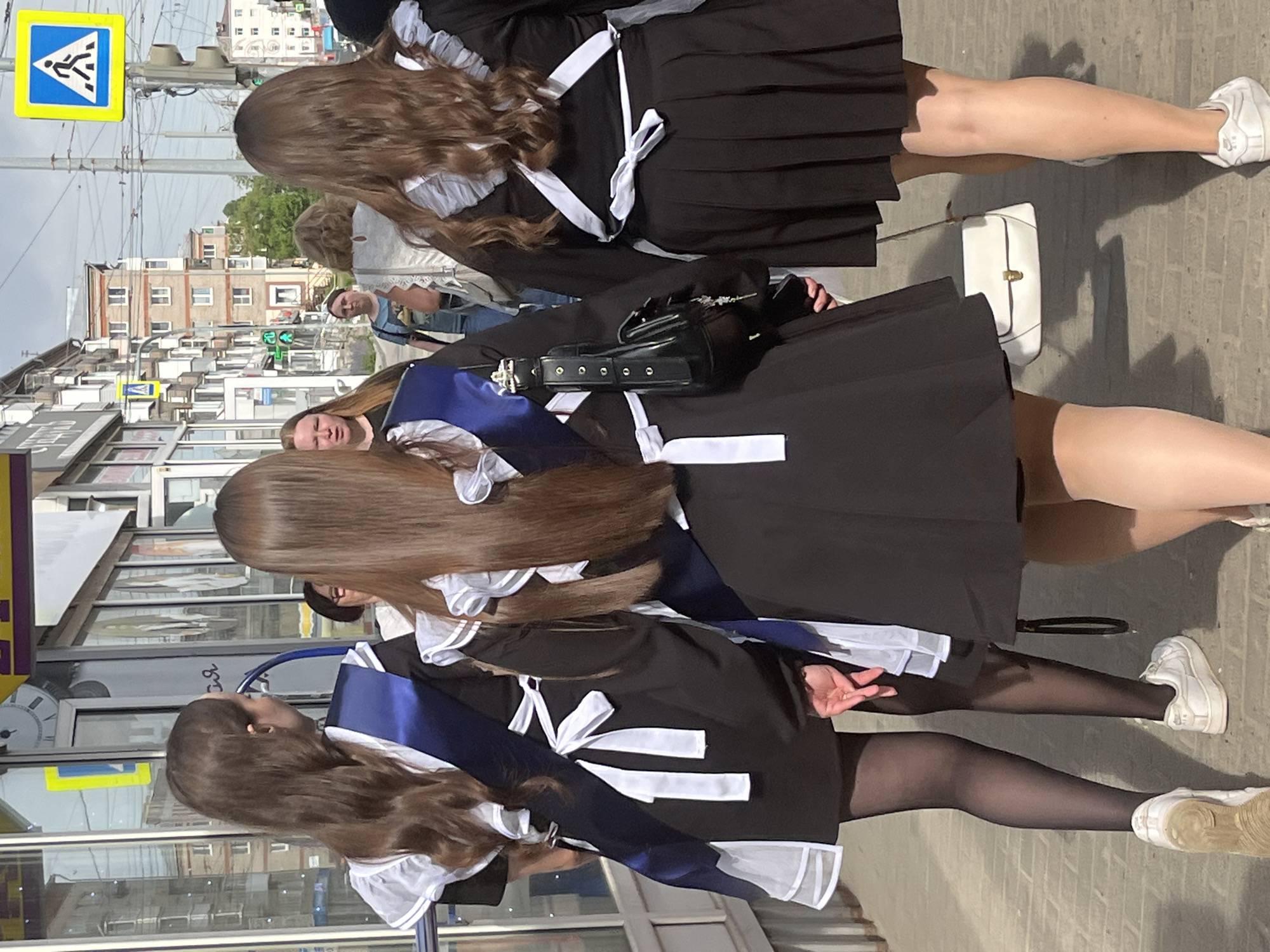 Students in uniform spotted on Izhevsk sidewalk