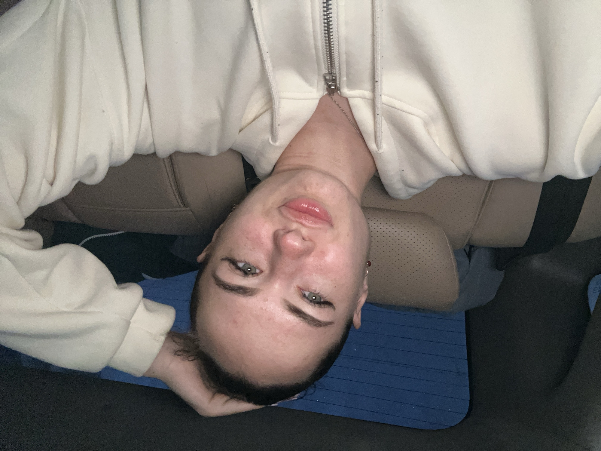 Selfie series in a cream hoodie across a few locations