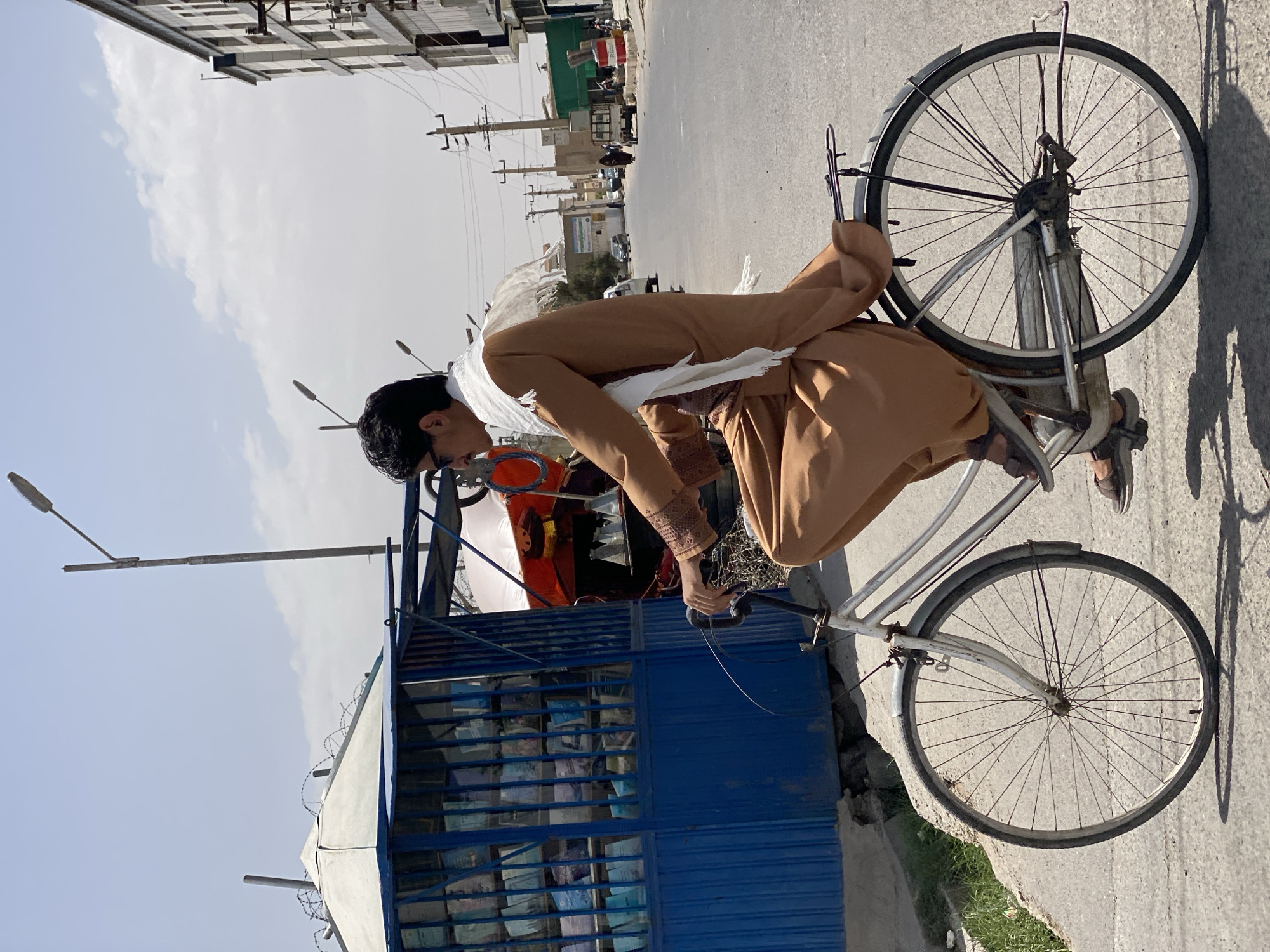 Everyday street life in Kandahar on a clear July morning