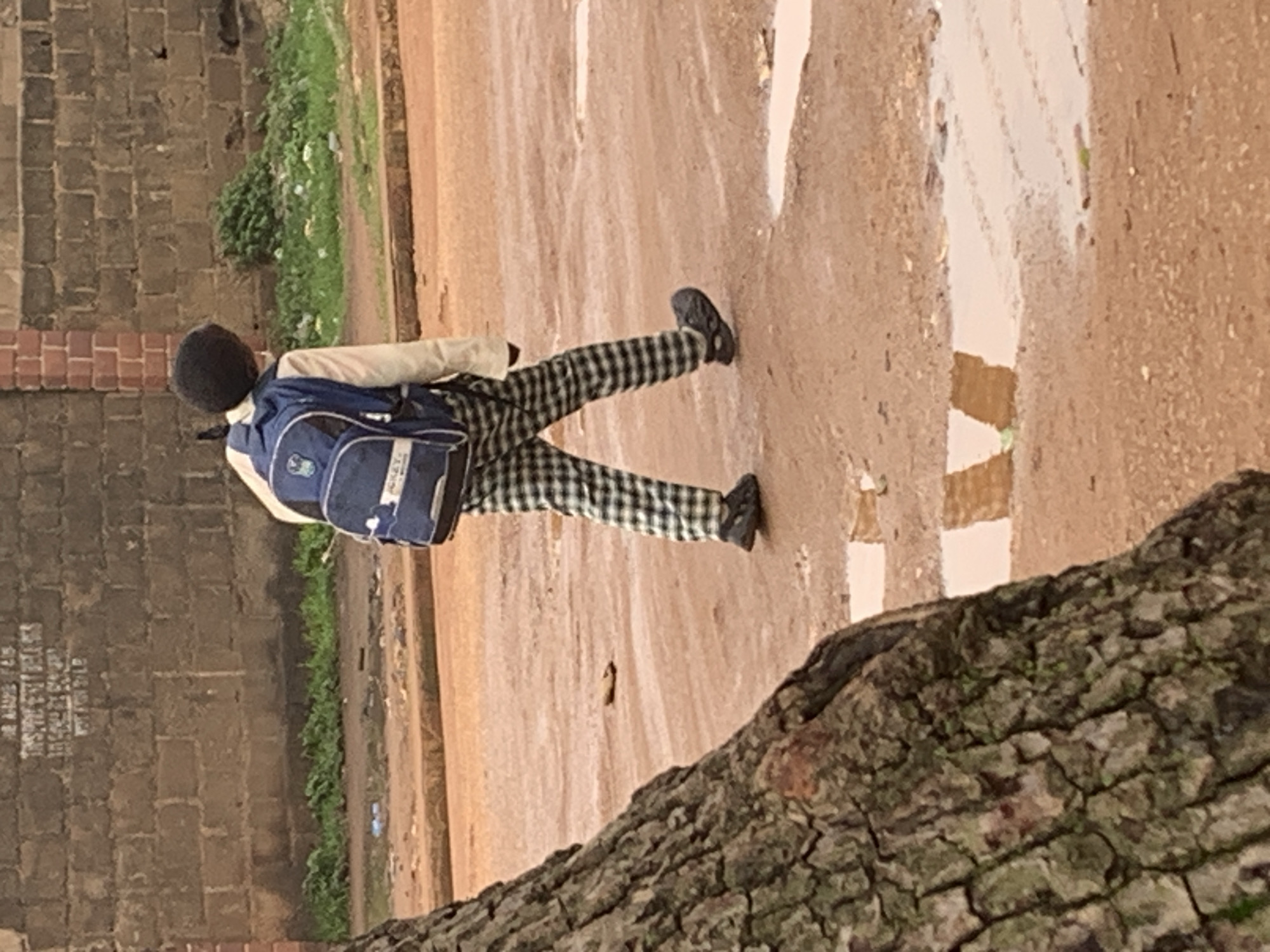 Morning street life in Bukuru, Nigeria — work, school, movement
