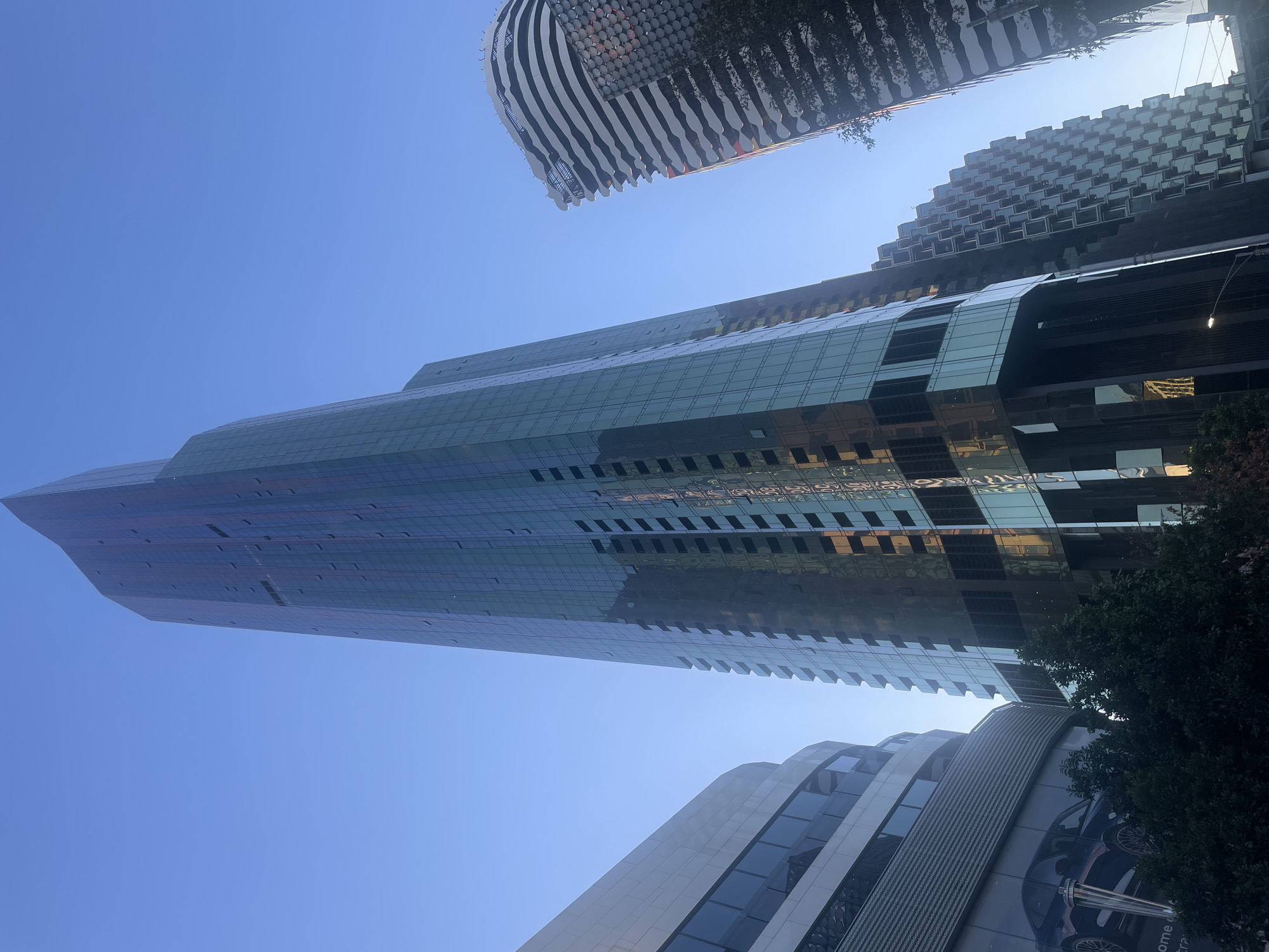 Eureka Tower rises against a clear Melbourne sky