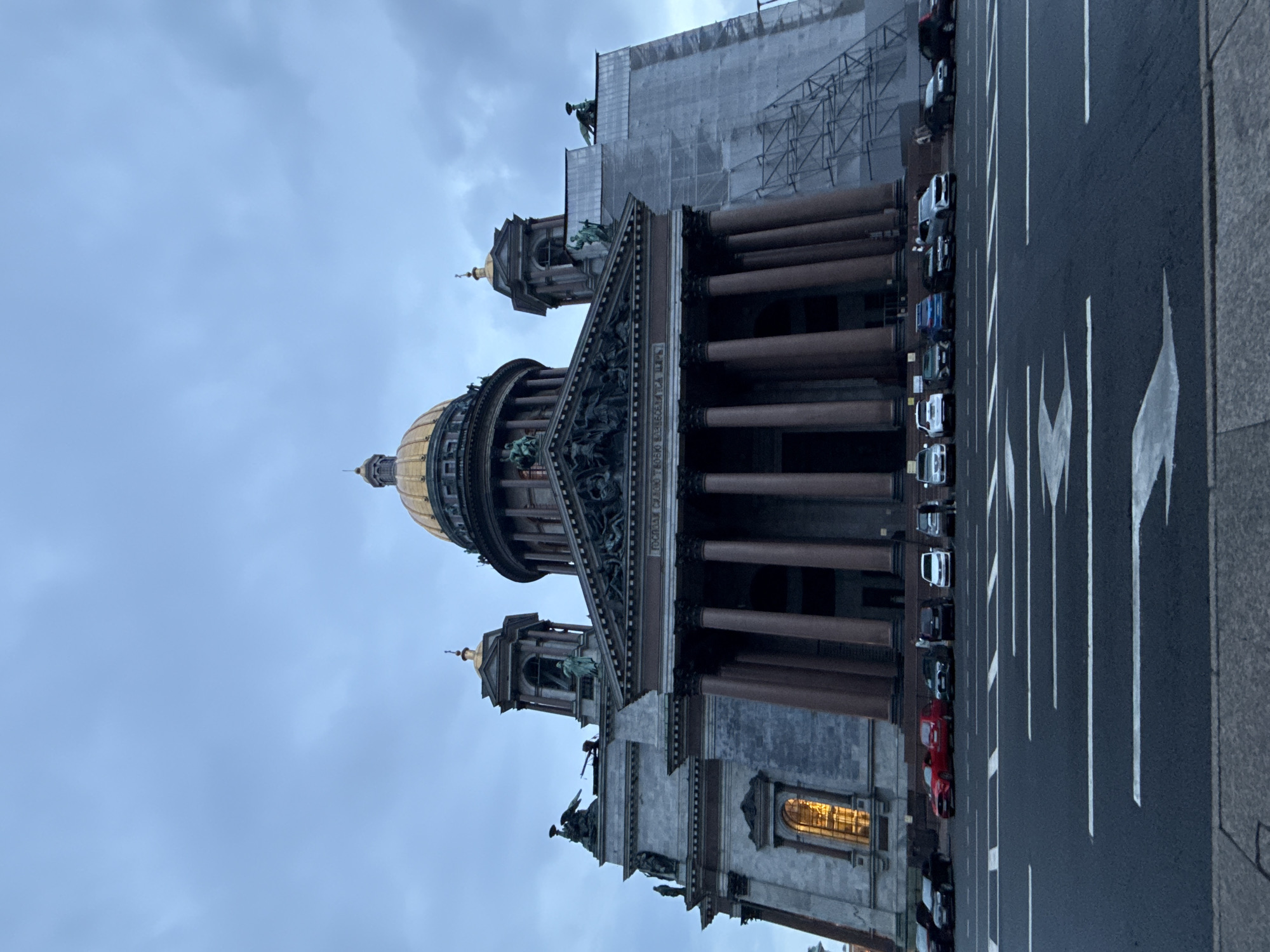 Classical domed building photographed from multiple angles in city square