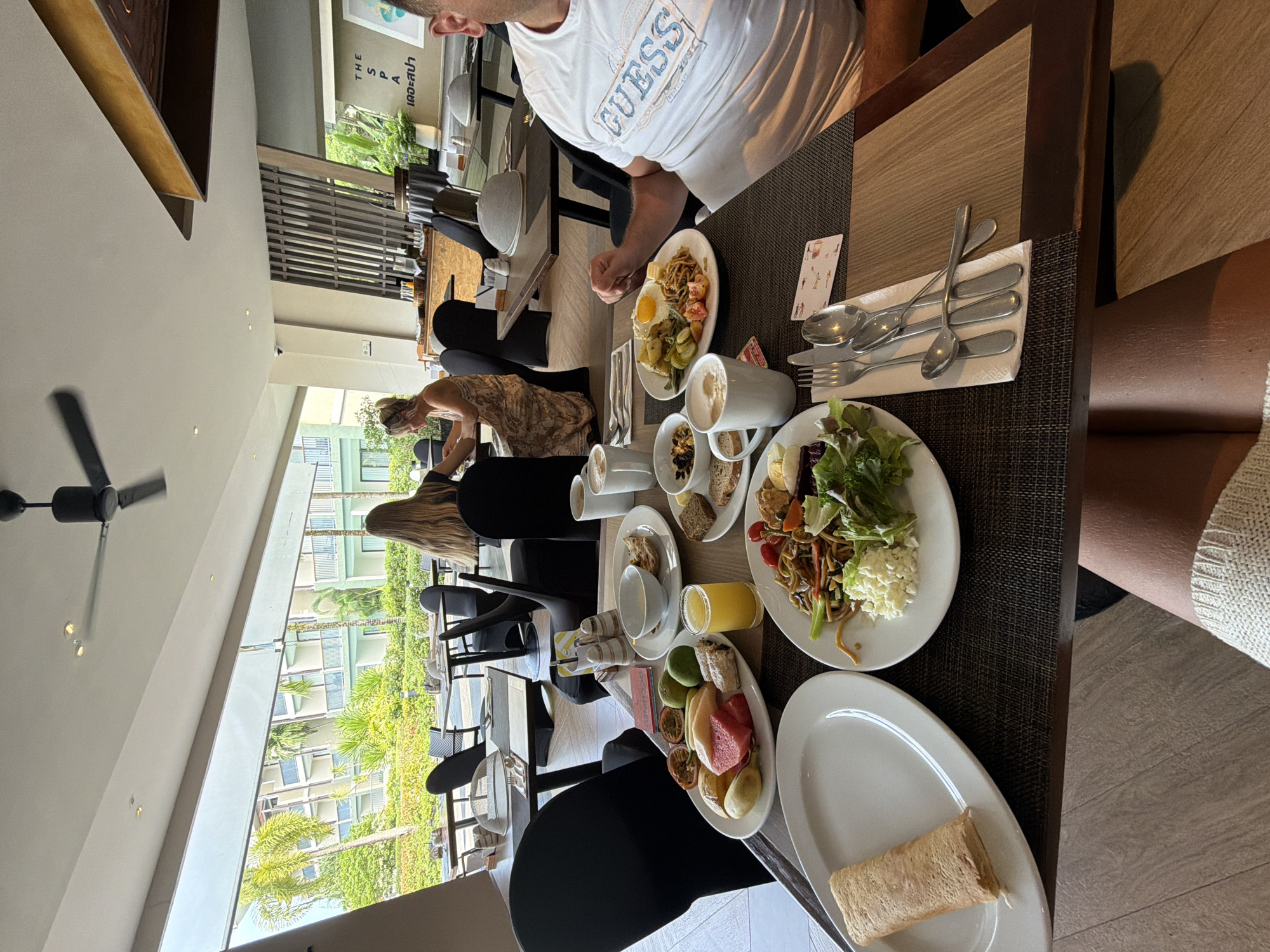 Resort breakfast with a lush garden view in Bang Muang