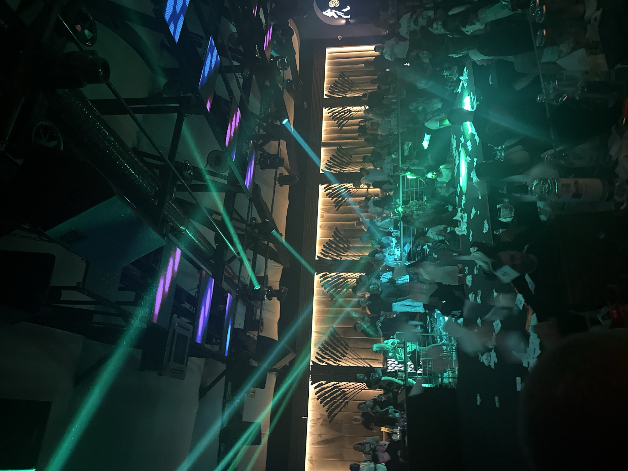 Night out at club with atmospheric lighting and selfies