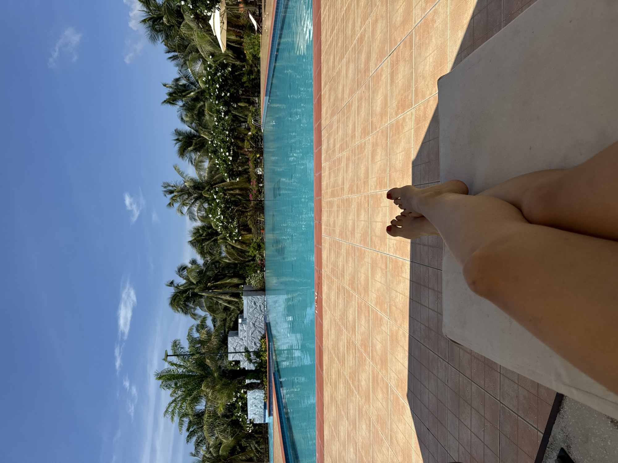Poolside relaxation session captured in Vietnam early morning hours