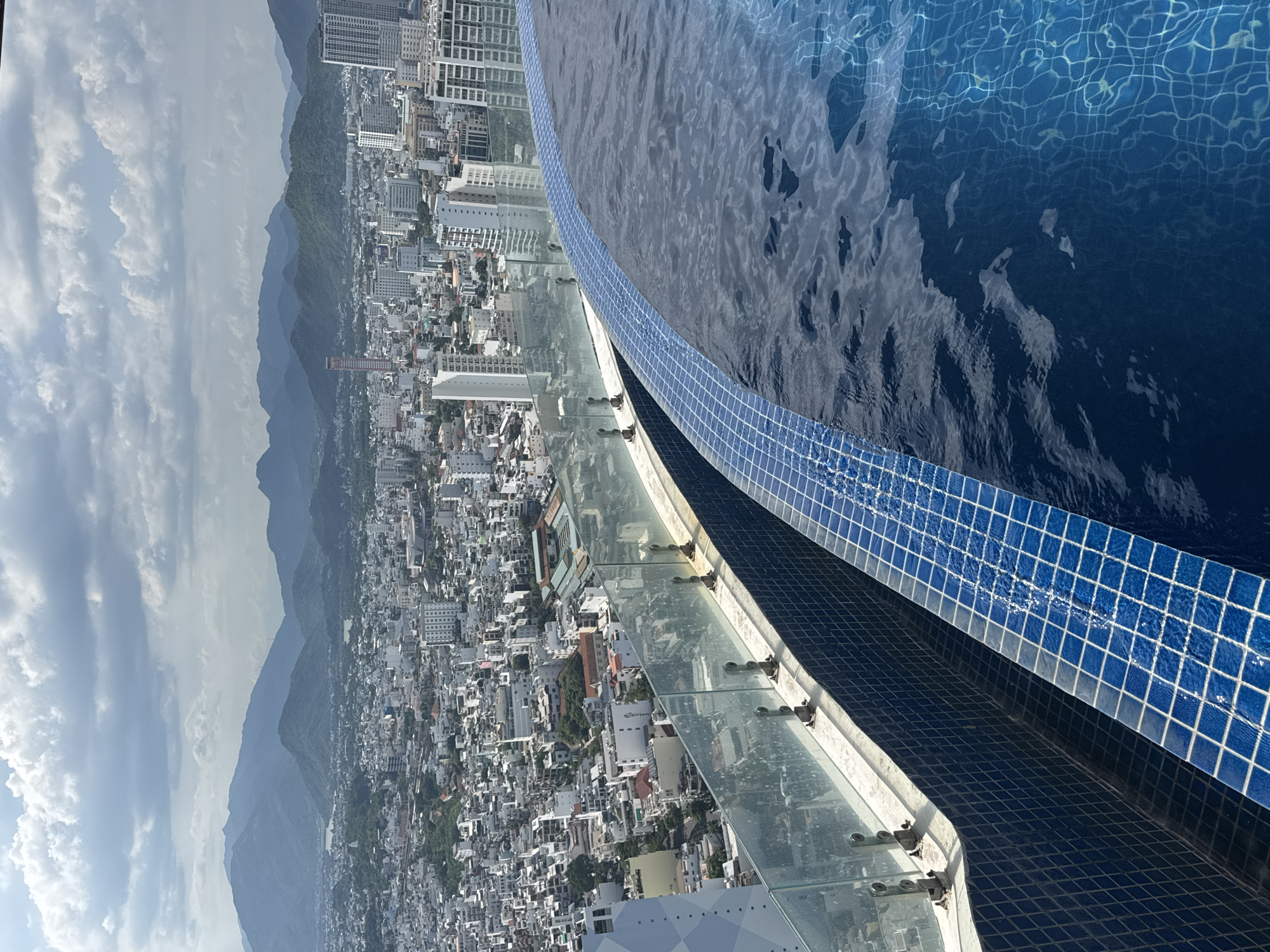 Rooftop infinity pool overlooking Nha Trang's coastal cityscape