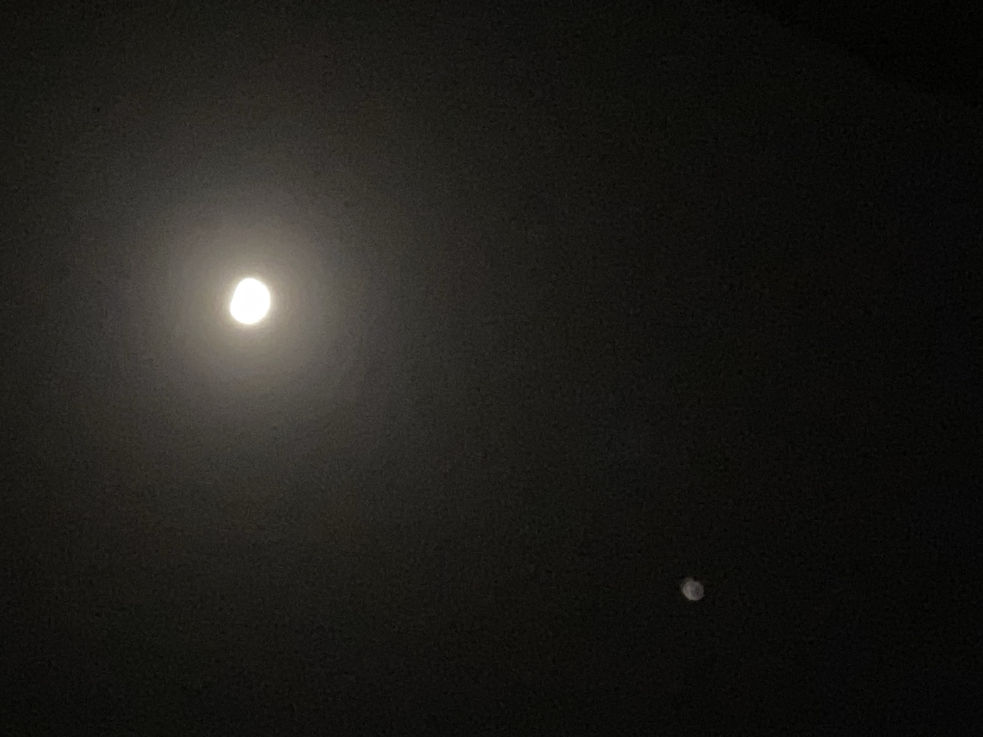 Crescent moon and unidentified object observed in Nigerian night sky