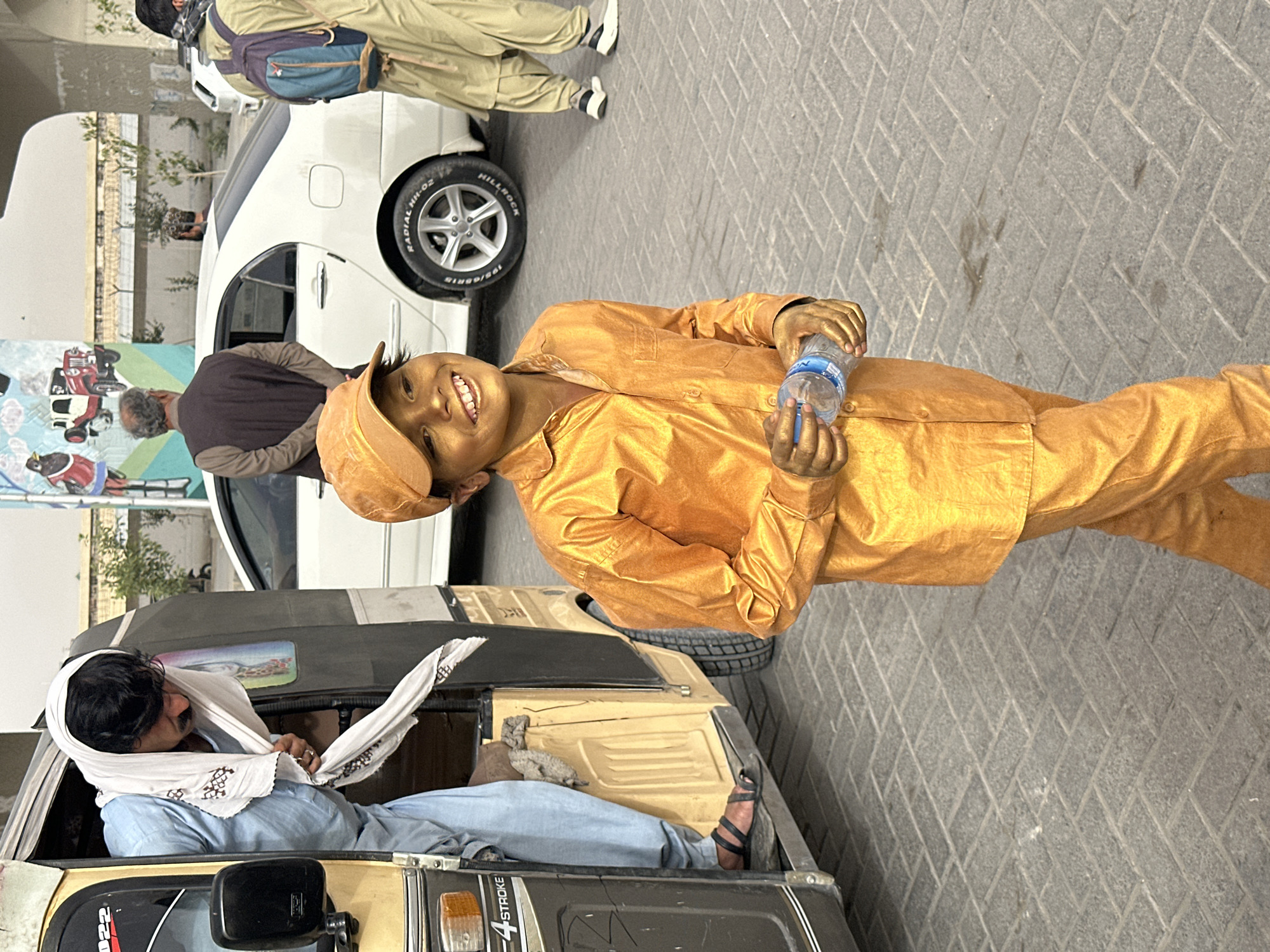 Gold-painted figure spotted on busy Quetta street