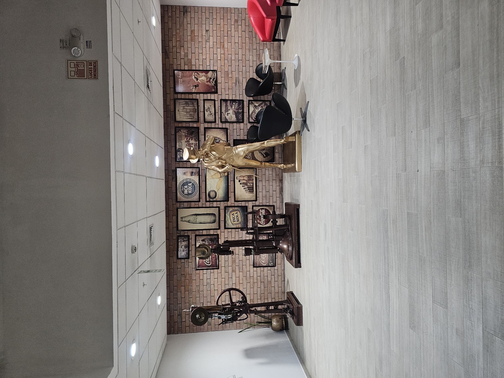 Commercial interior with red brick walls observed in La Molina