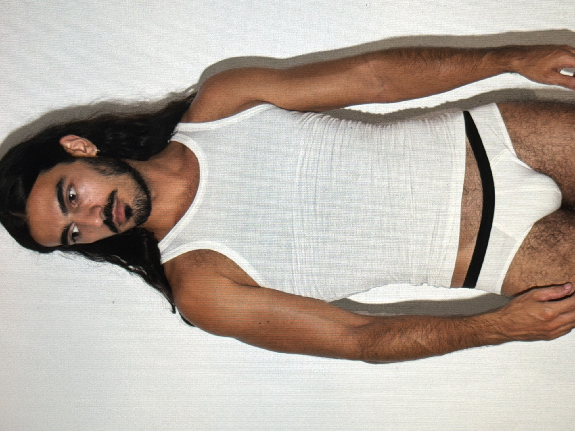 Man photographed on white backdrop in North Kuta