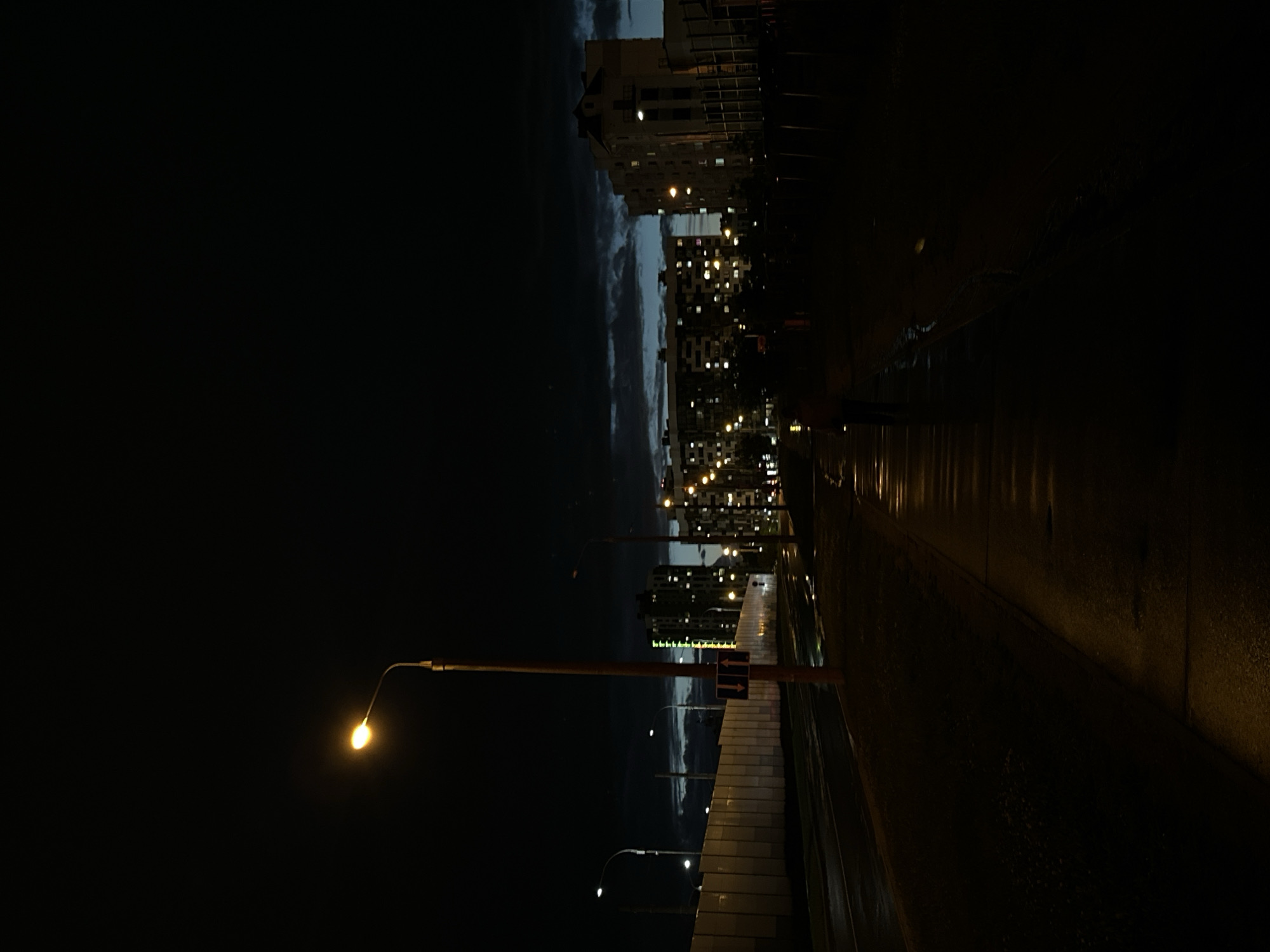 Evening lights illuminate Minsk streets and Svislach River