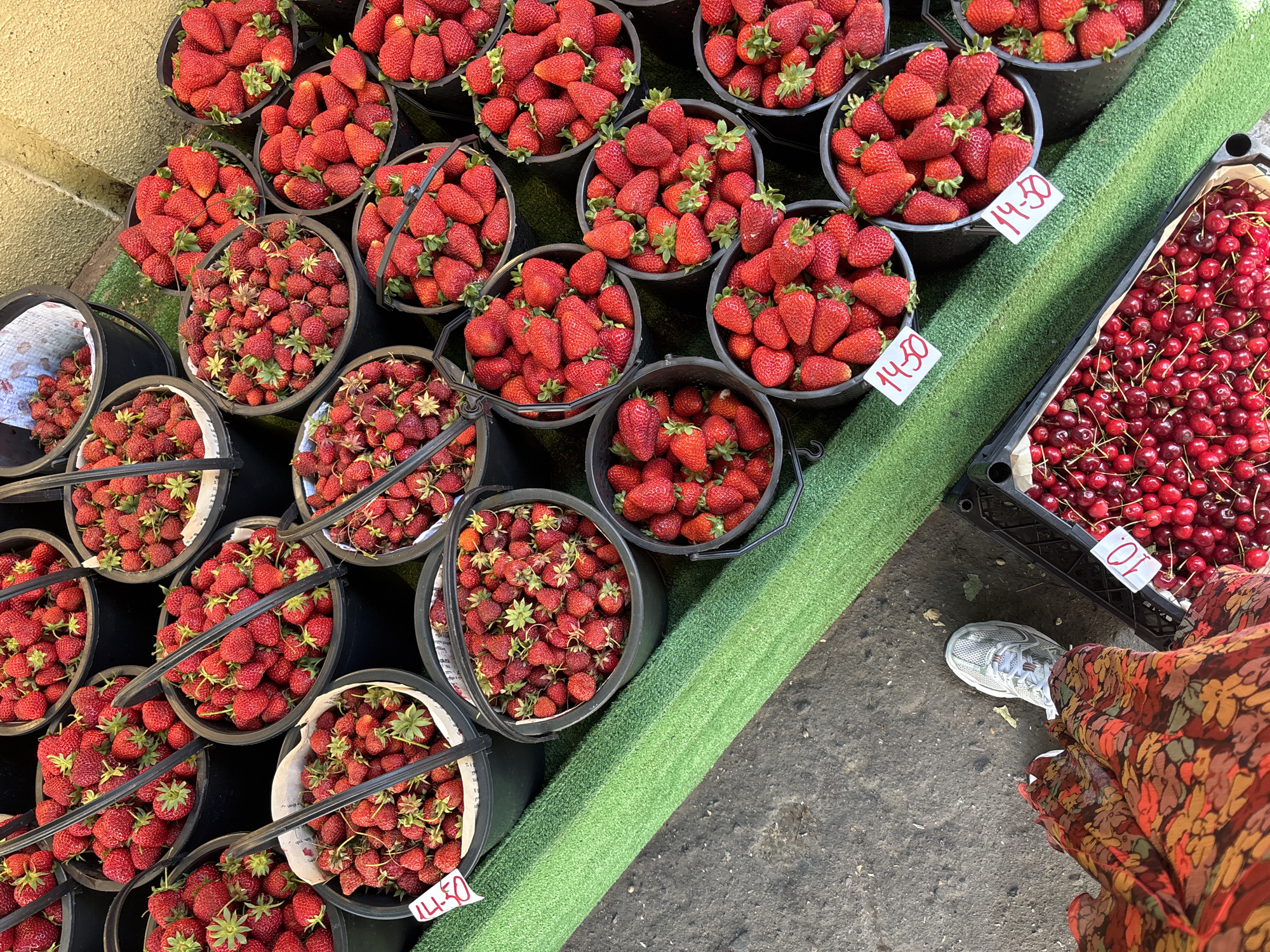 Fresh strawberries displayed at outdoor market in Tbilisi