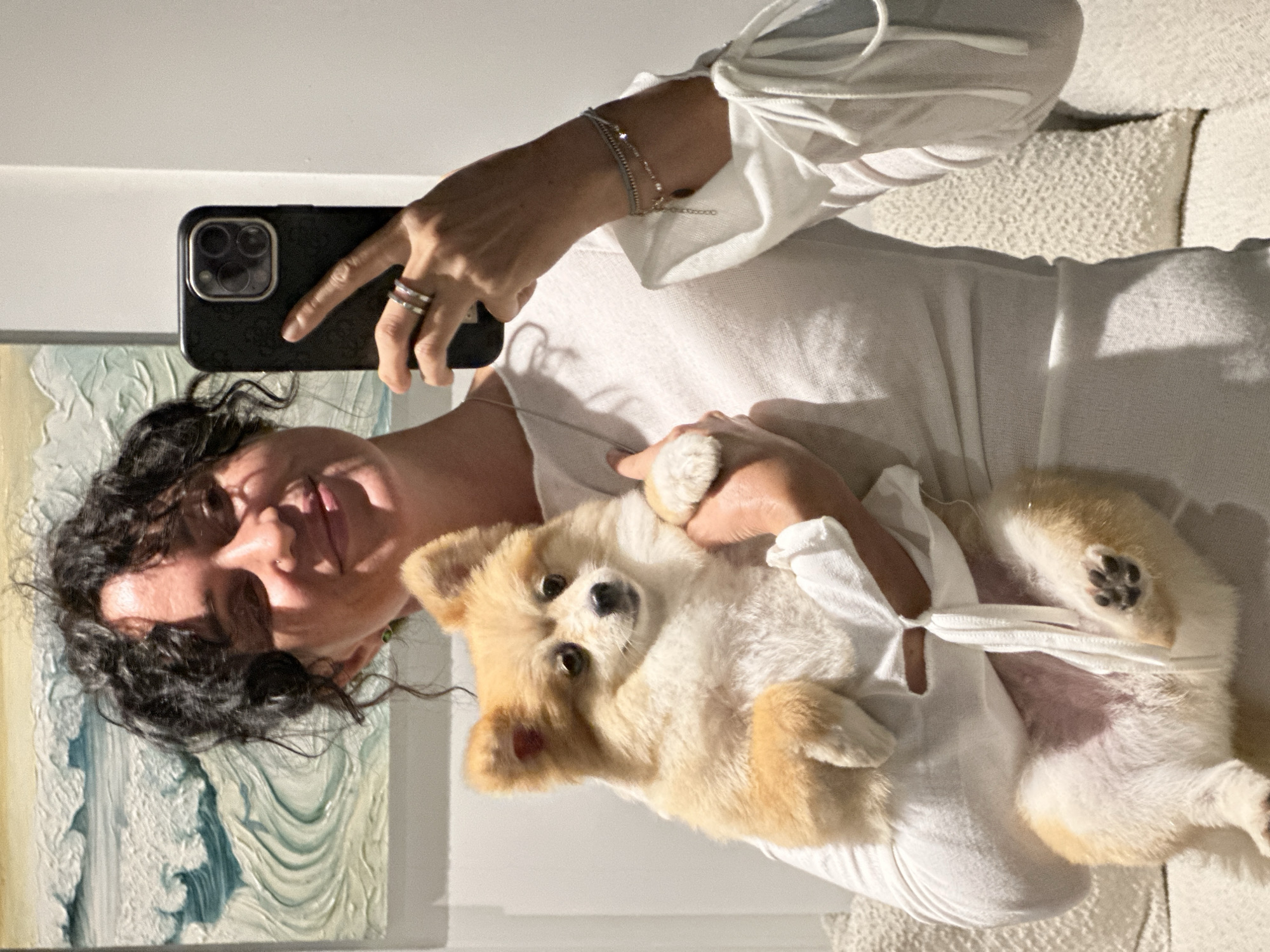 Mirror selfie with a Pomeranian in North Kuta