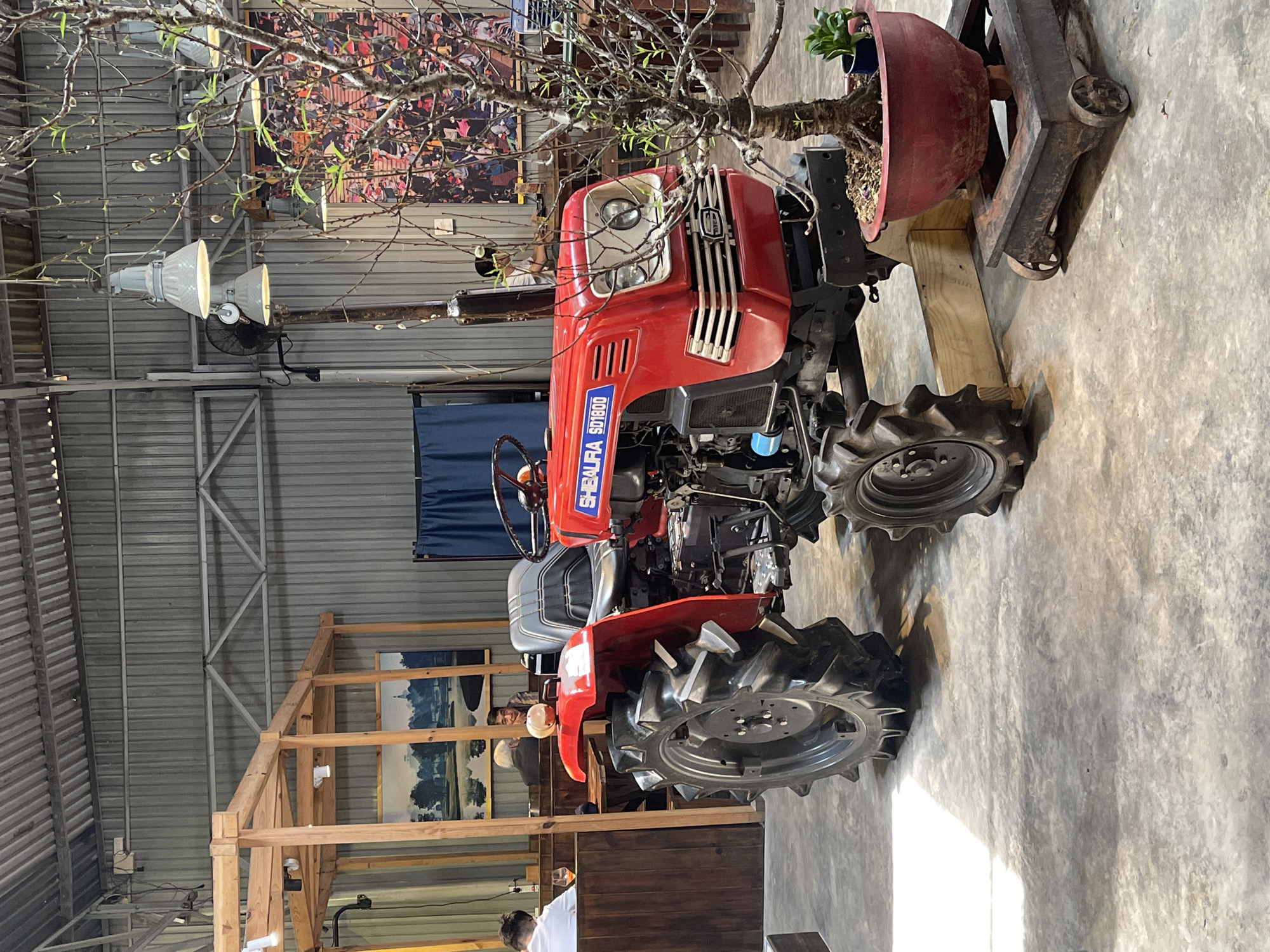 Early morning scenes from tractor-themed Vietnamese coffee shop in Da Lat