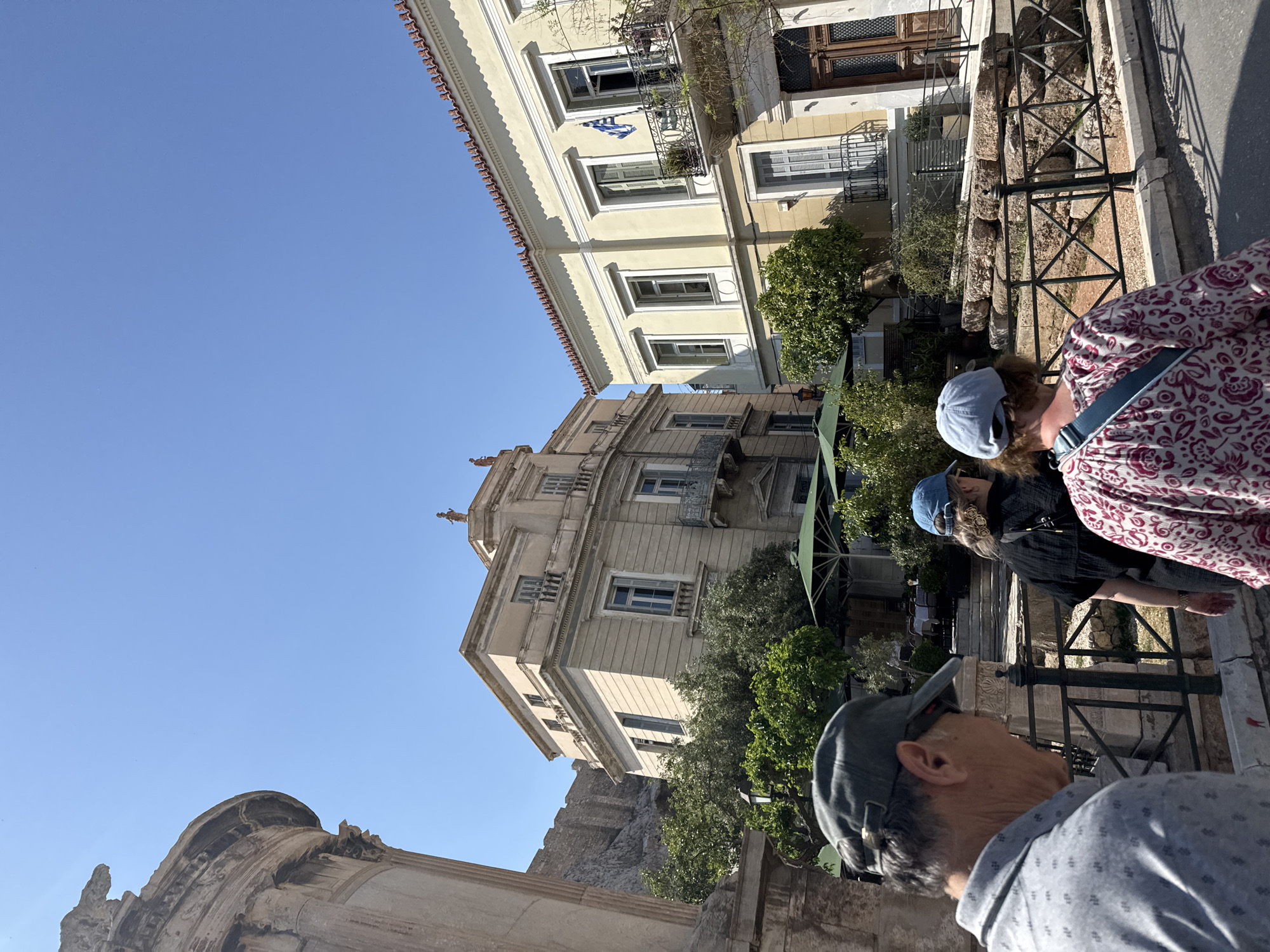 Sunny midday scenes captured across central Athens pedestrian areas