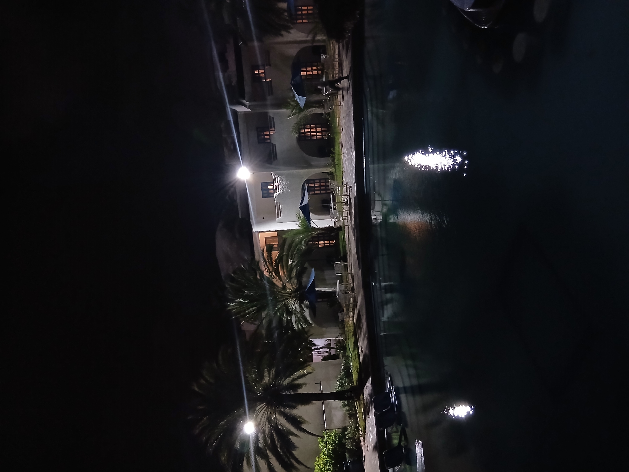 Nighttime waterfront scene captured in Altagracia, Venezuela