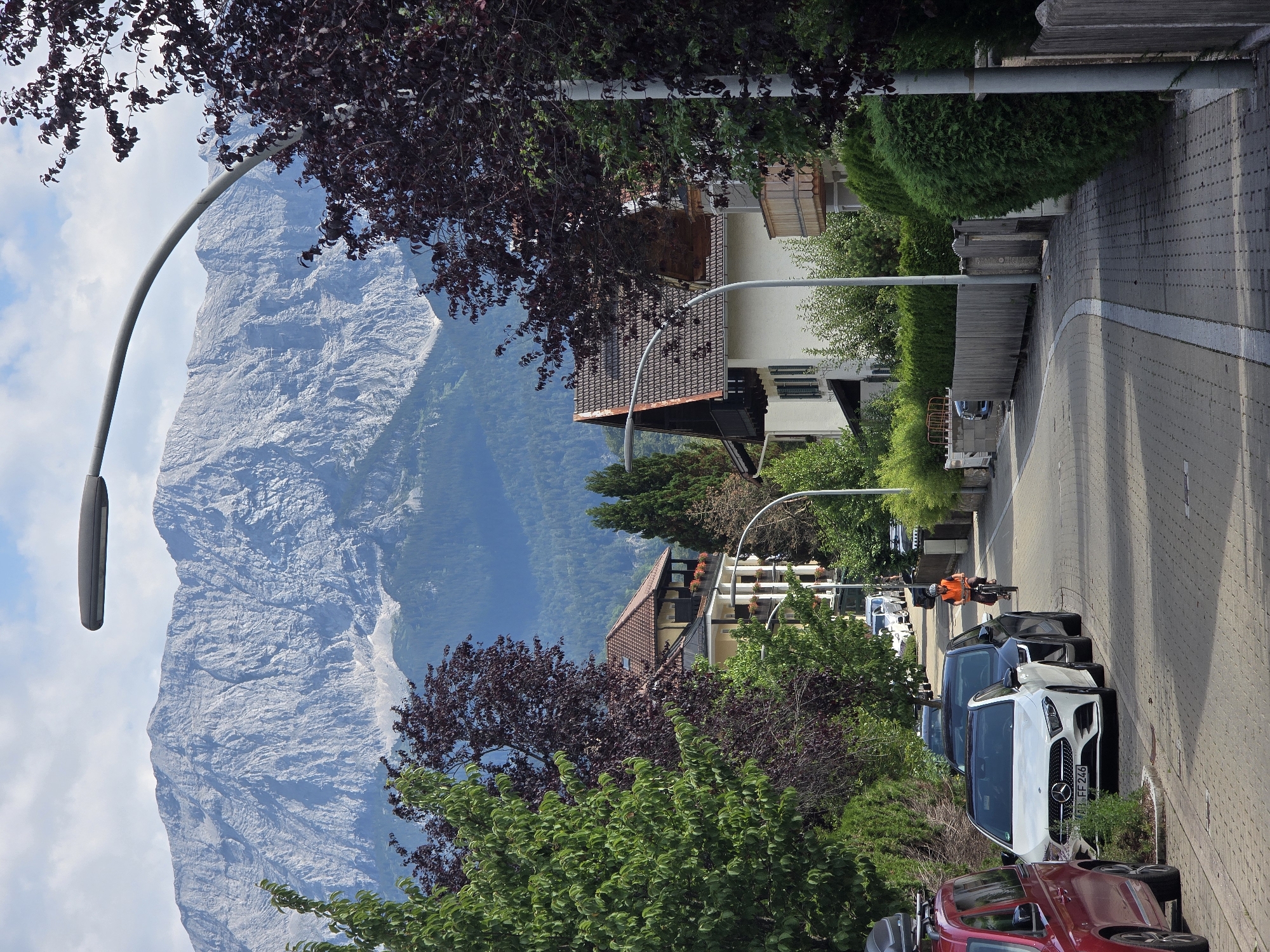 Wet streets and Alpine backdrop in Garmisch-Partenkirchen