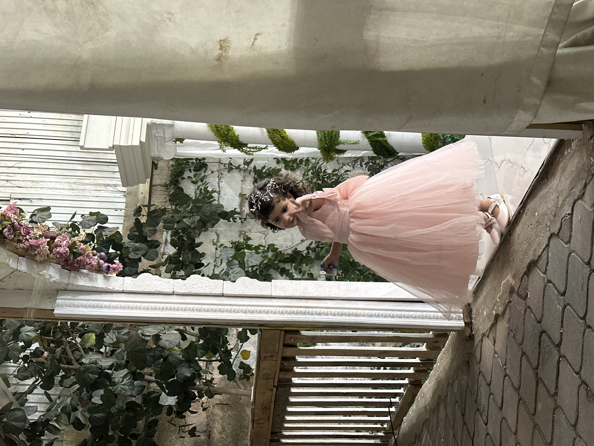 Evening formal gathering documented in Gaza courtyard venue