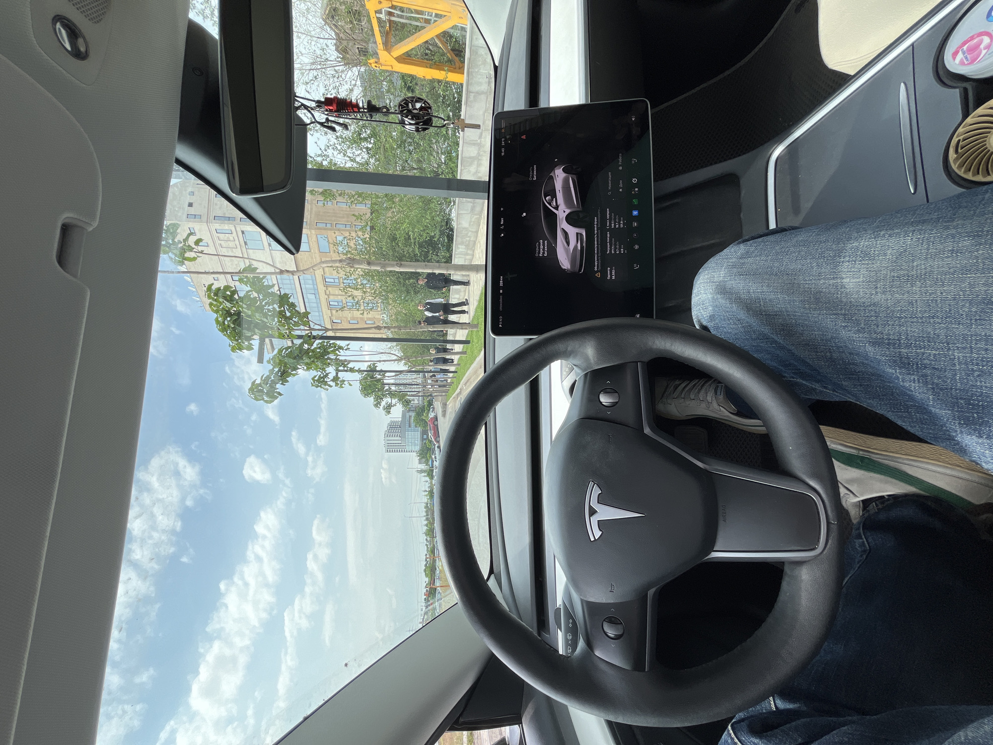 Tesla driver documents routine Yerevan street scenes, architecture