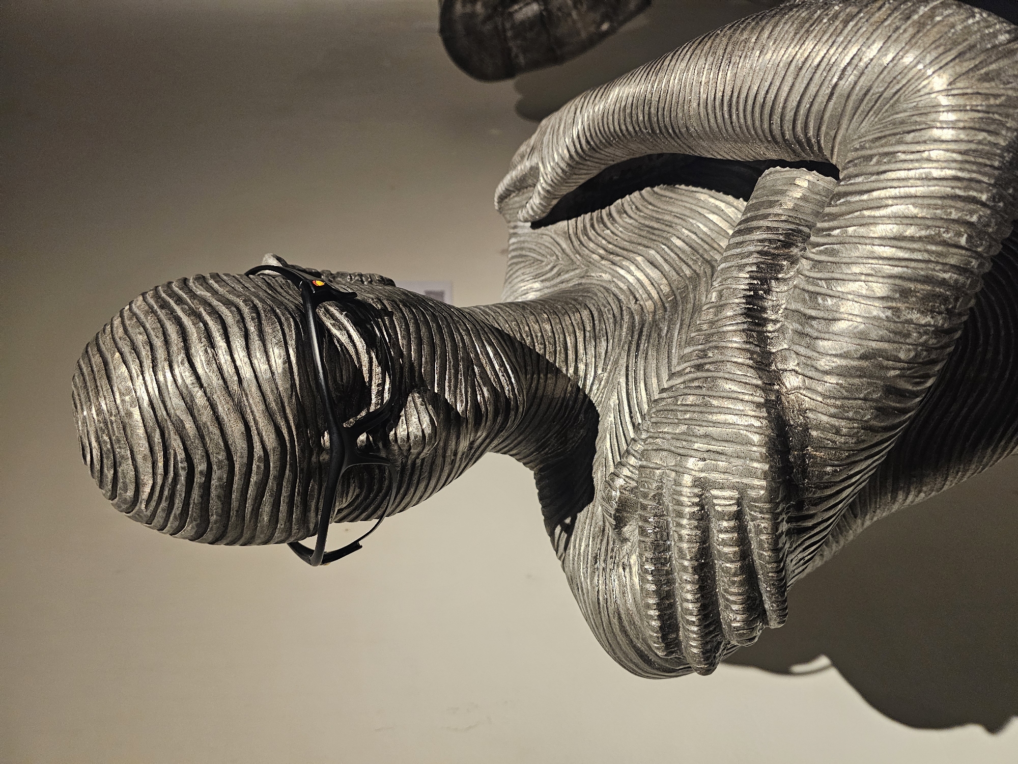 Art sculptures with glasses motif documented across Denpasar