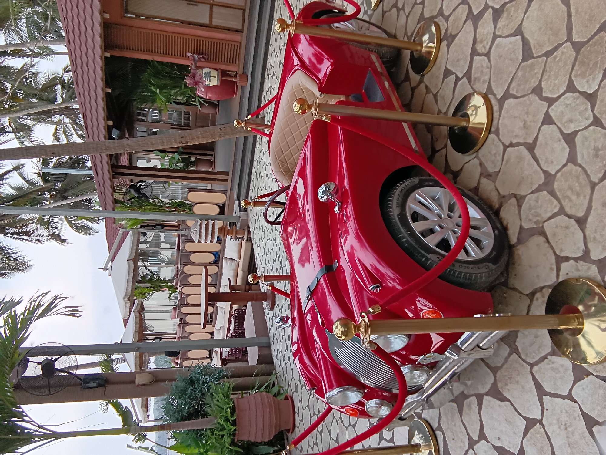 Vintage red car on display in Marna, India