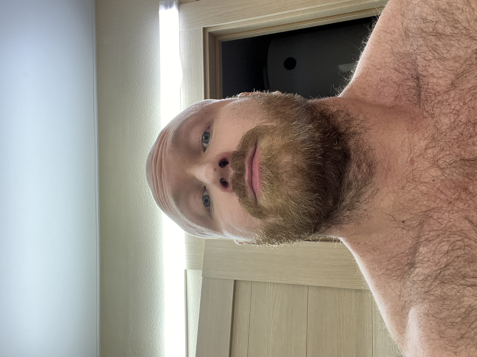 Man takes indoor selfie in Noviy, Russia