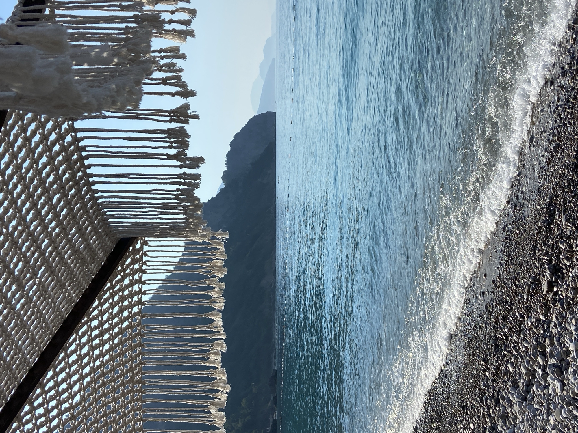 Quiet morning at a pebble beach resort on the Montenegrin coast