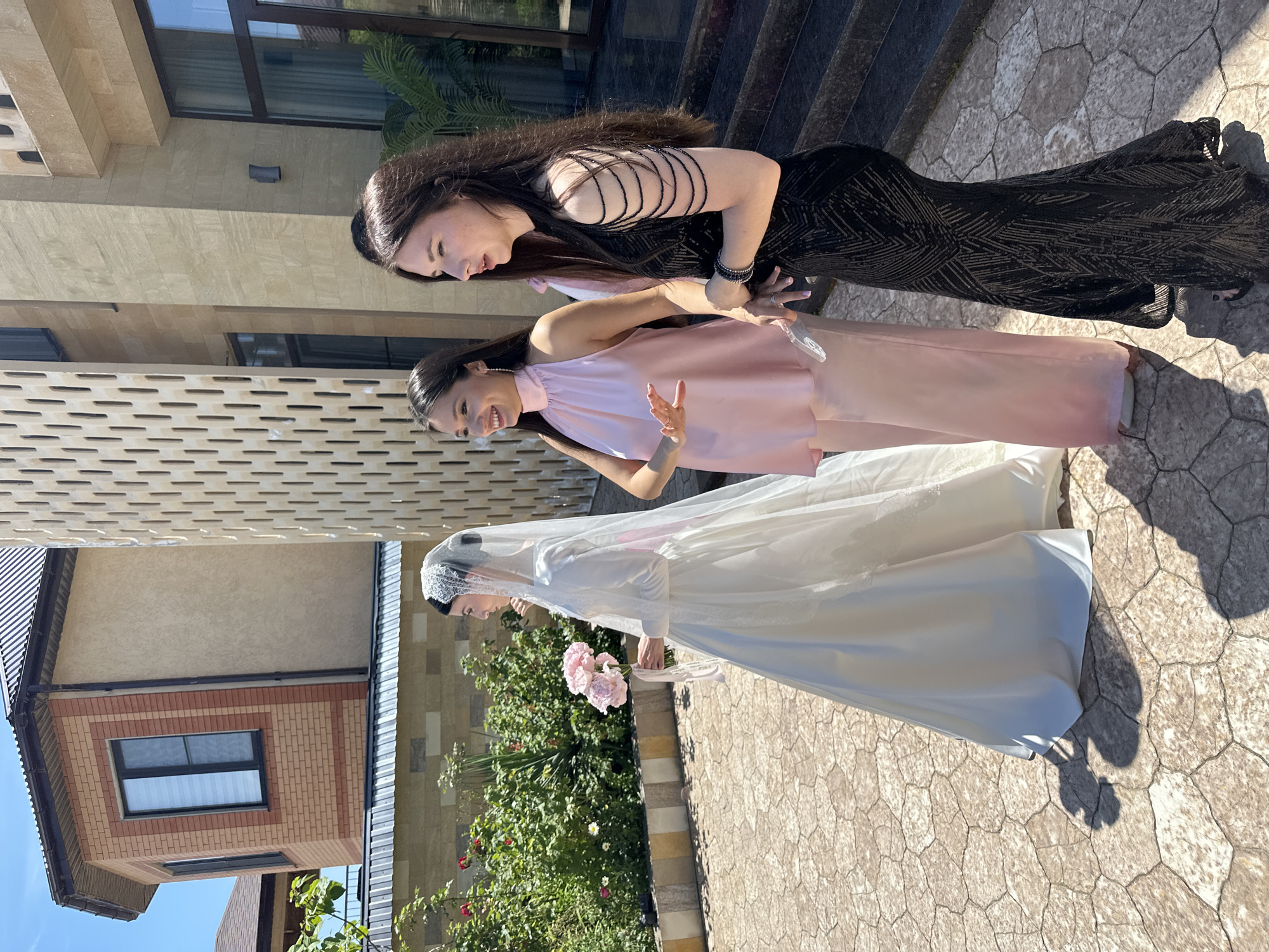 Wedding photoshoot documented in Makhachkala courtyard