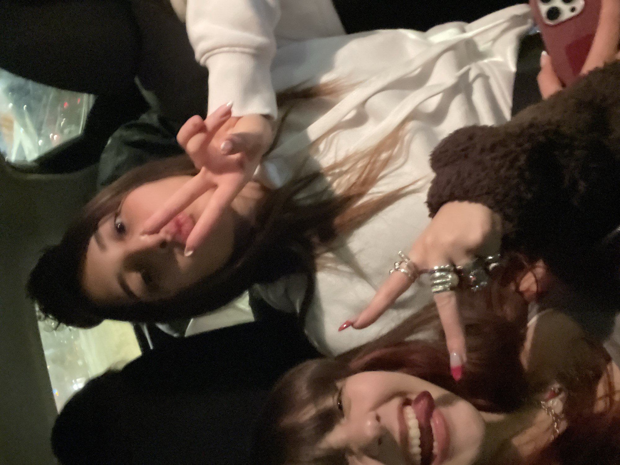 Young women take group selfies in Petah Tikva