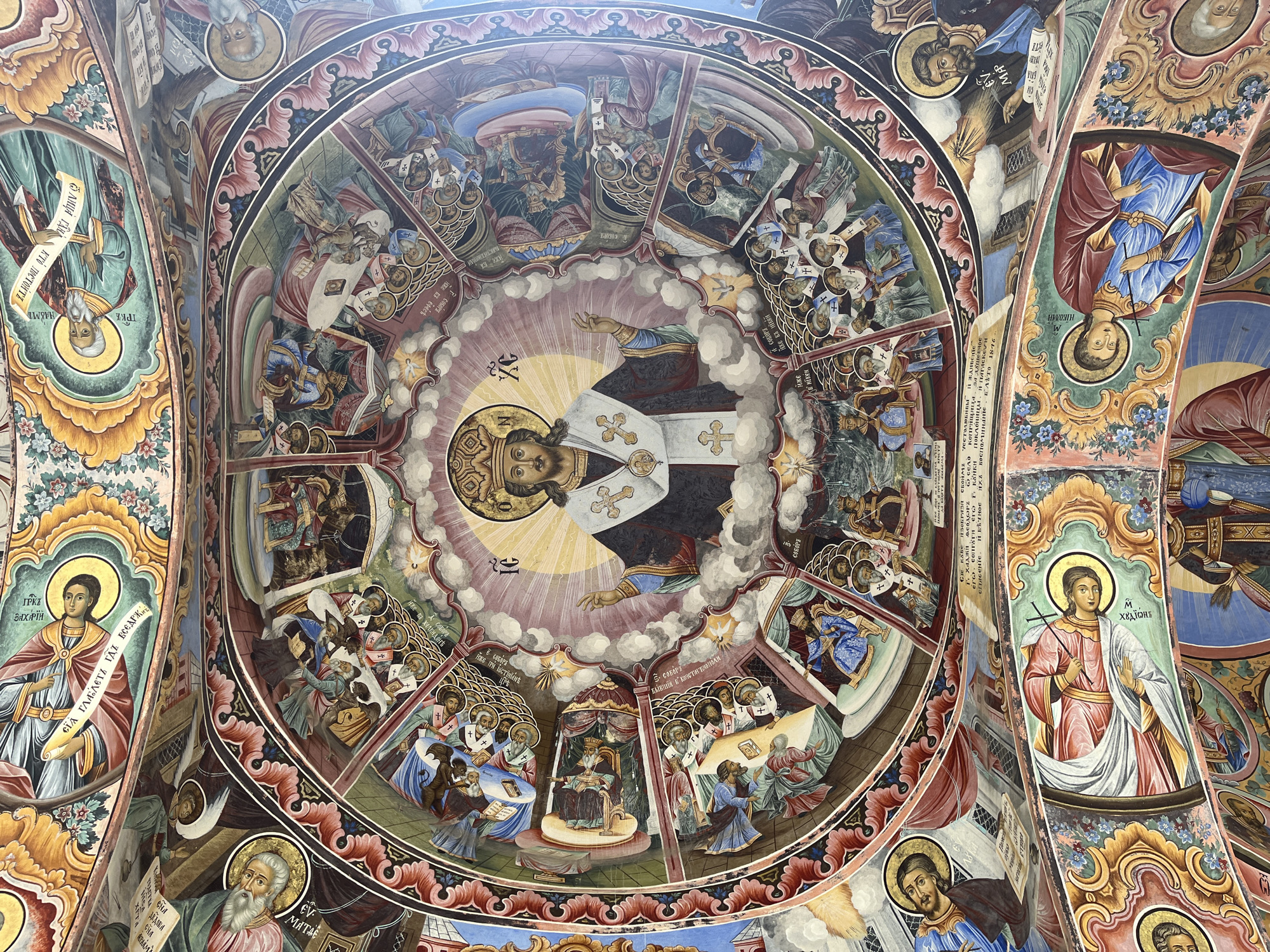 Visitor documents Rila Monastery's frescoes and distinctive architecture