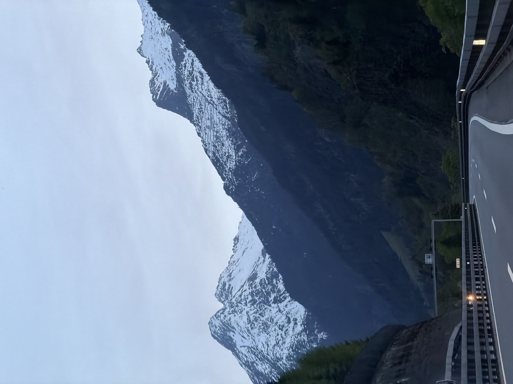 Snow-capped mountains observed from highway in Gurtnellen, Switzerland