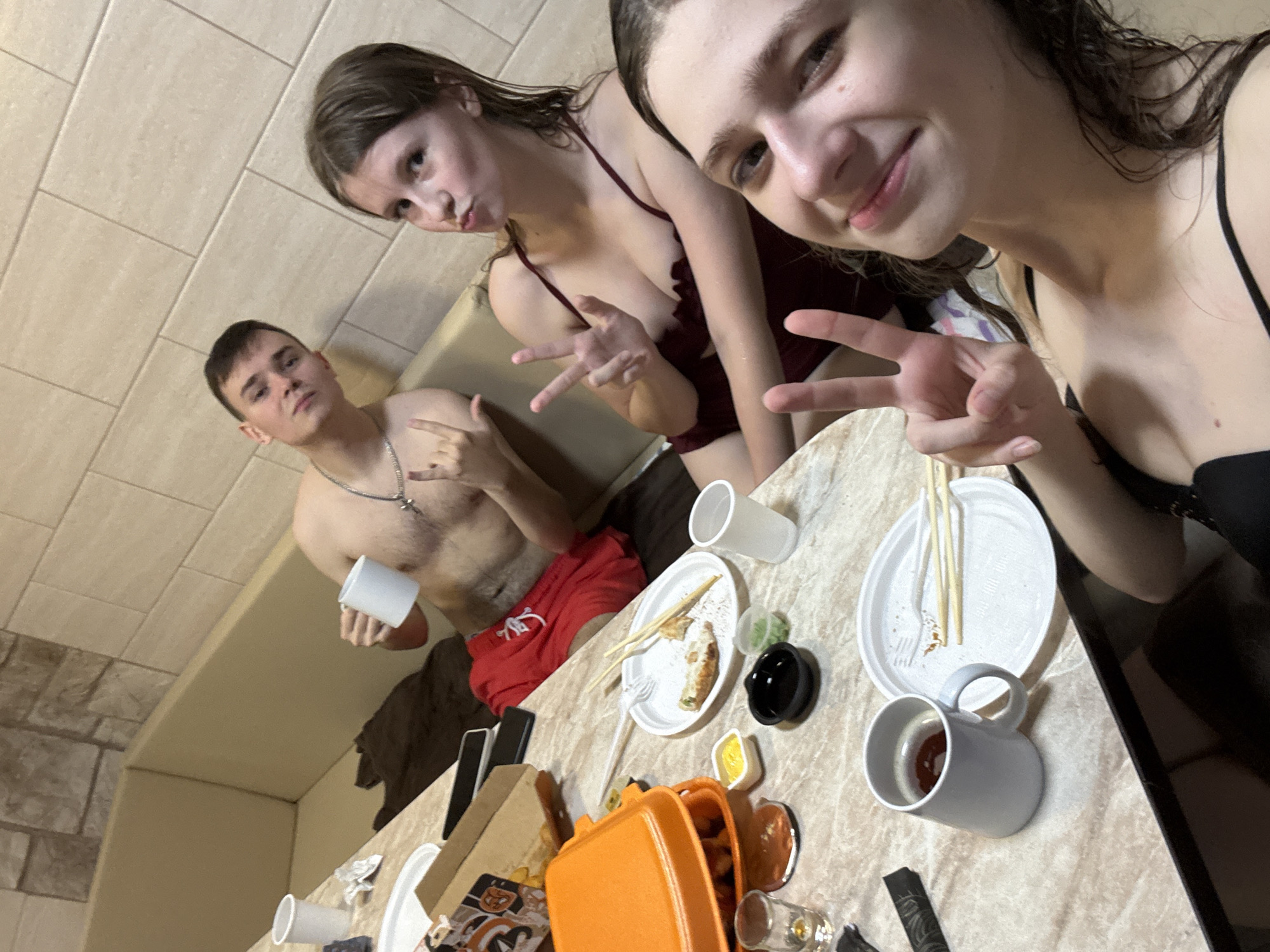 Casual gathering in a tiled indoor relaxation space, Birobidzhan