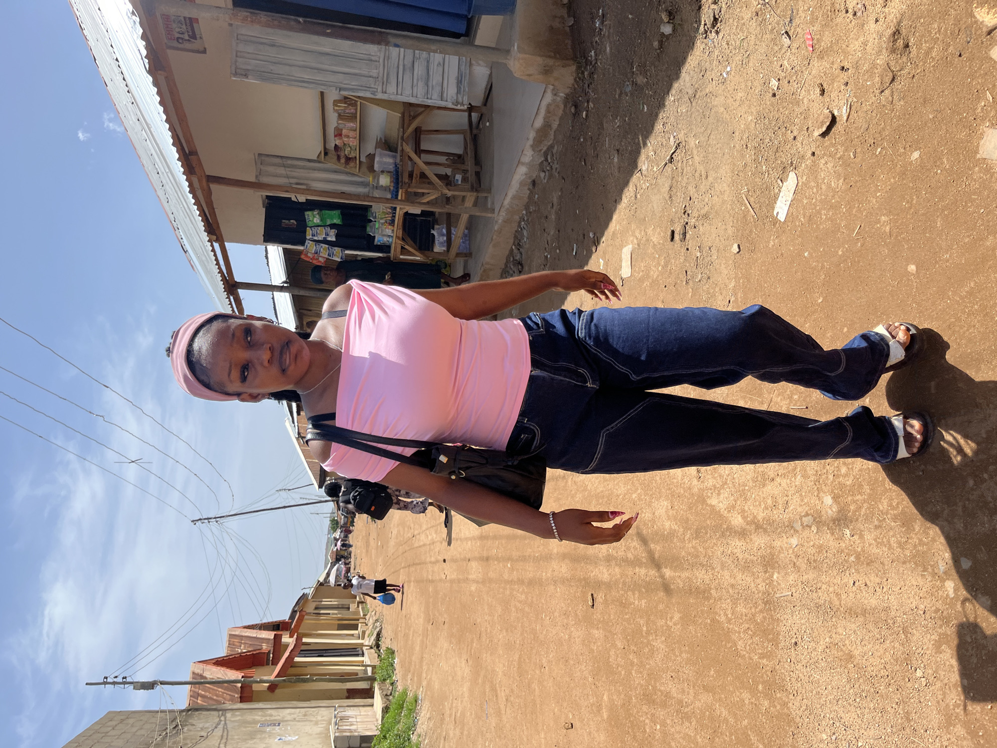 Residents gather on sunny streets in Jos, Nigeria