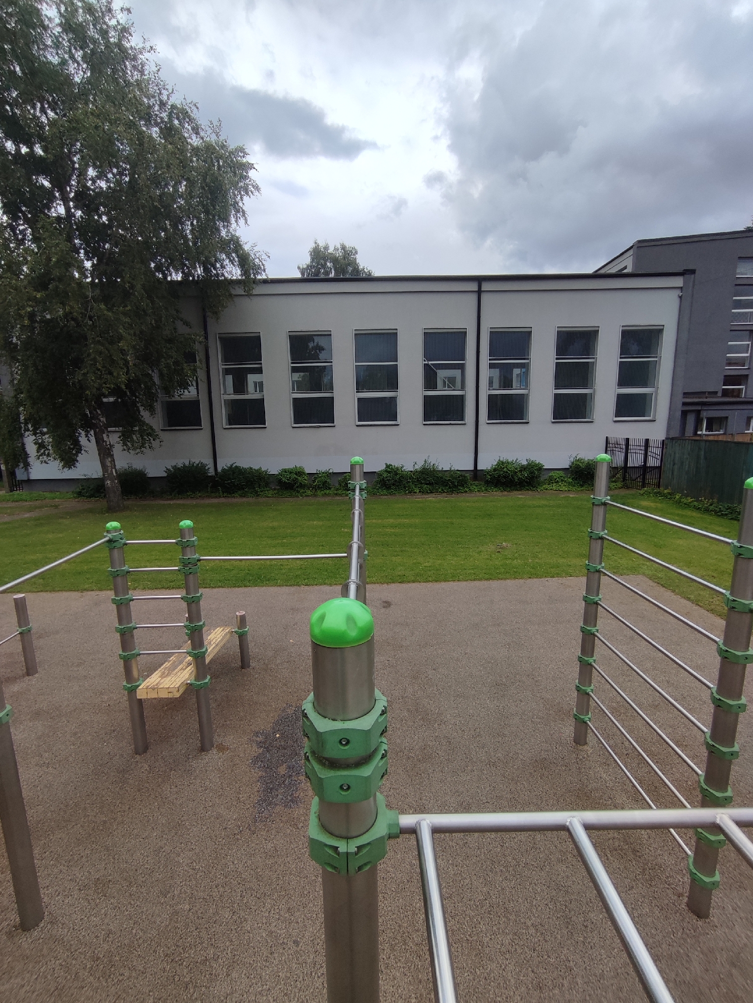 Riga residential courtyard with exercise equipment and green spaces
