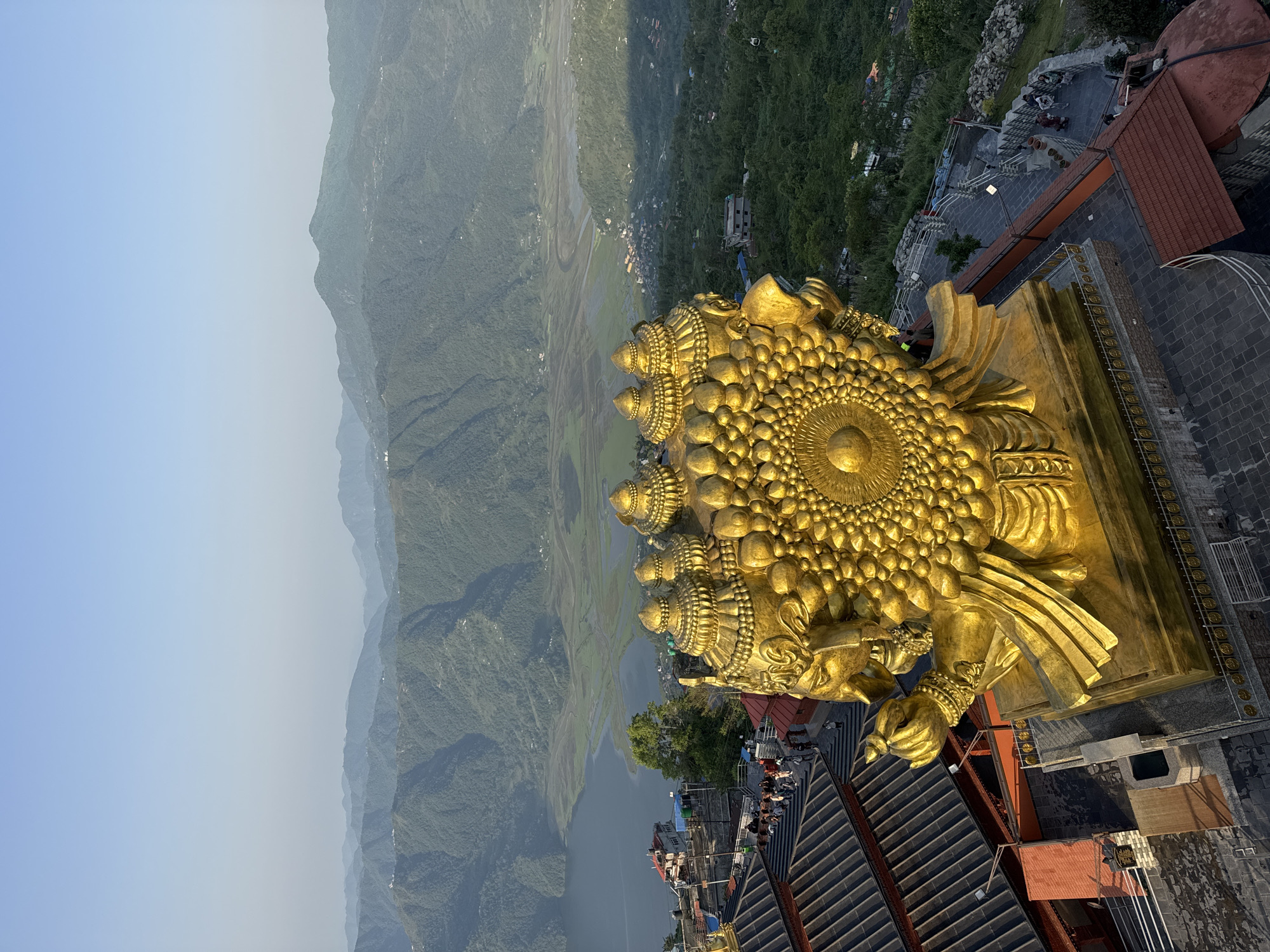 Witness documents aerial views of Pokhara cityscape and statue