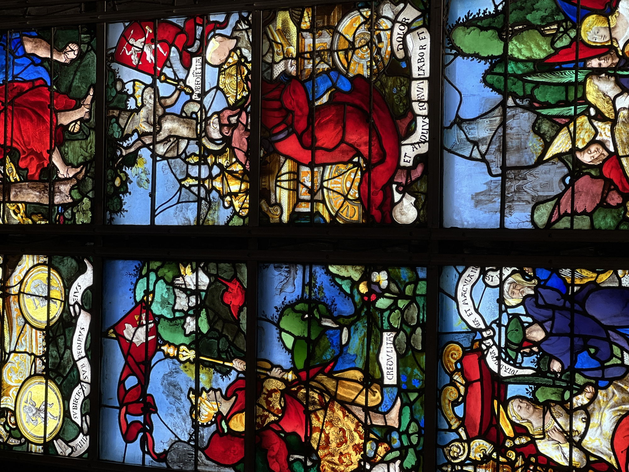 Tourist documents historic Rouen landmarks and stained glass