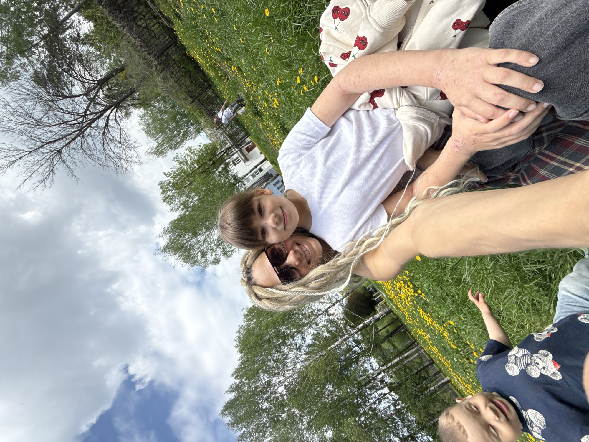Woman and child share casual outdoor moment in Rusanovo