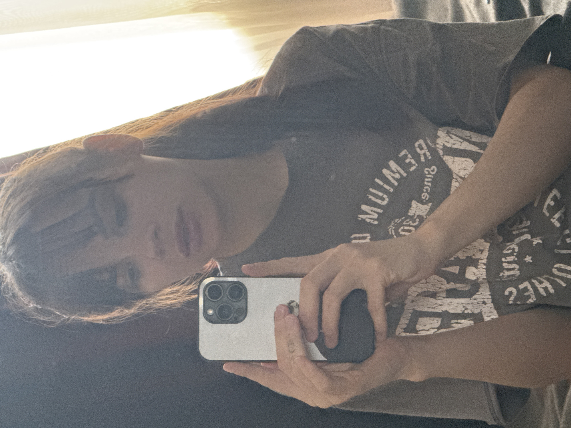 Woman takes morning bedroom selfies in Rostov-on-Don apartment
