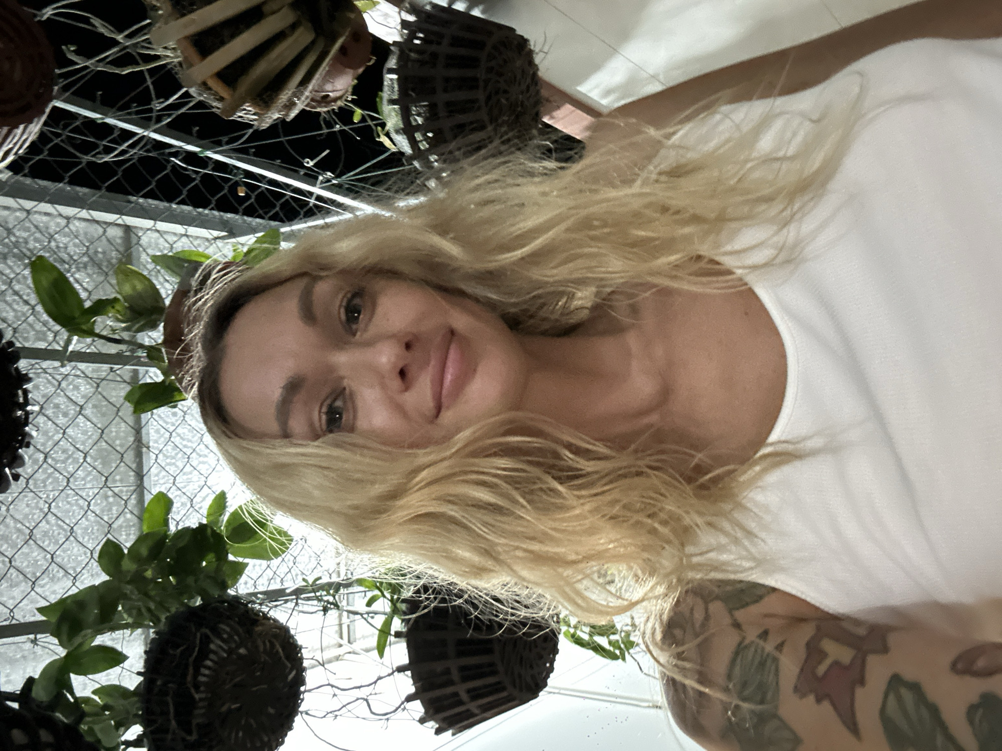 Woman takes selfie in Vietnam showing tattoo
