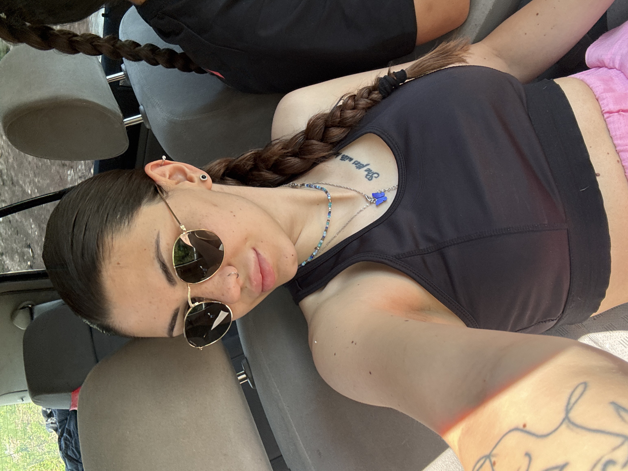 Young women photographed resting in car in Belopoptsi, Bulgaria