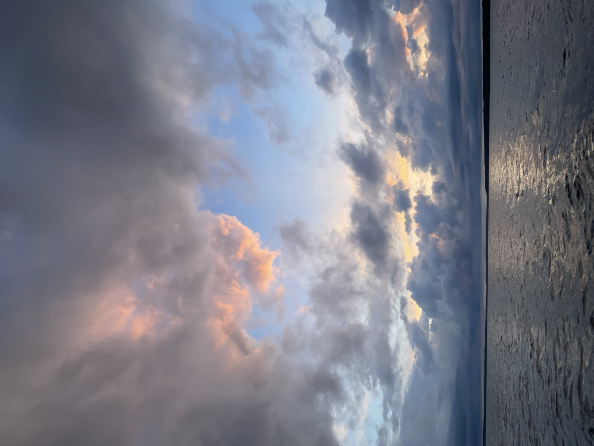 Stormy evening sky over a Russian lake shore