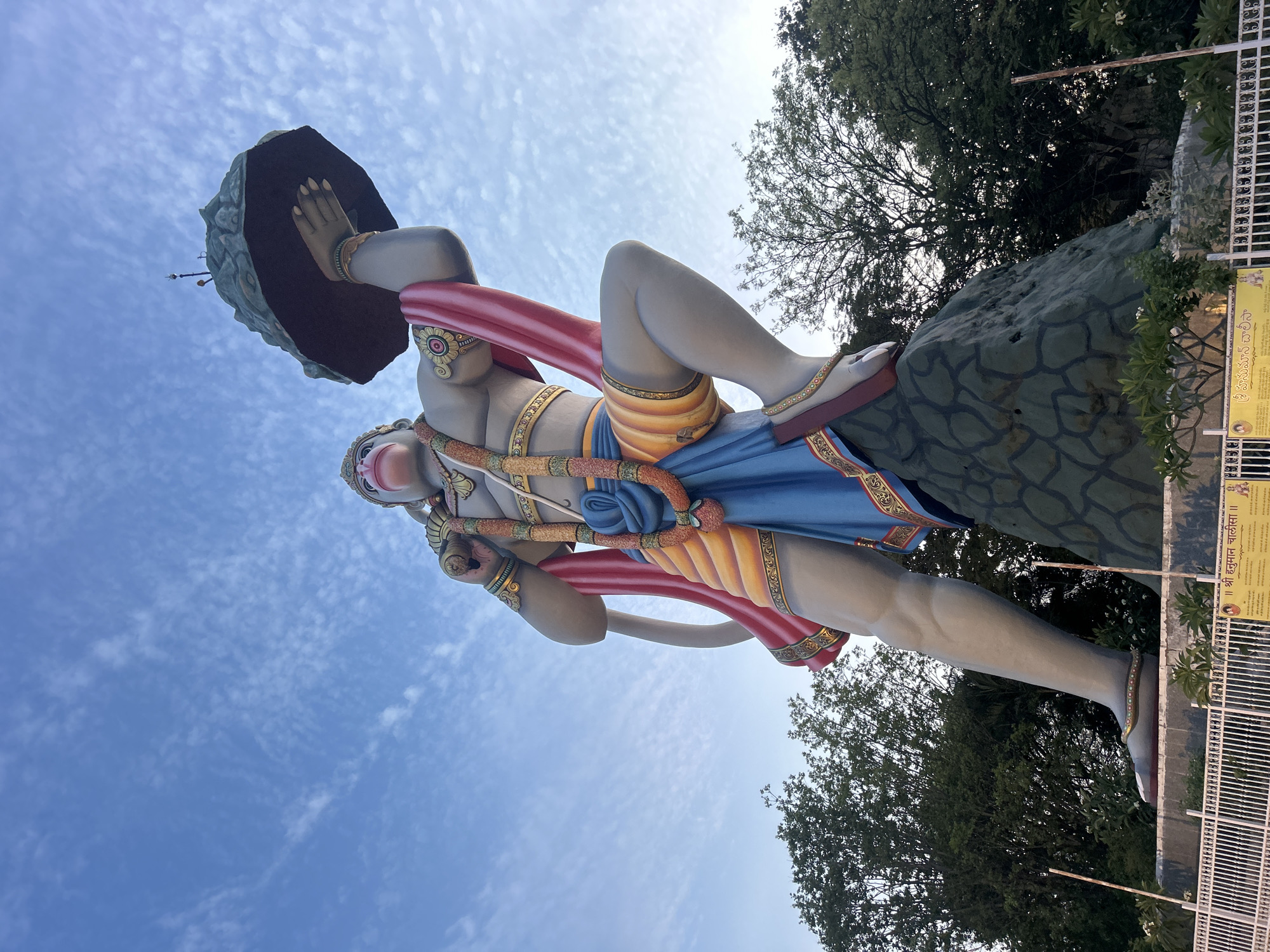 Daily life and religious statue observed in Puttaparthi