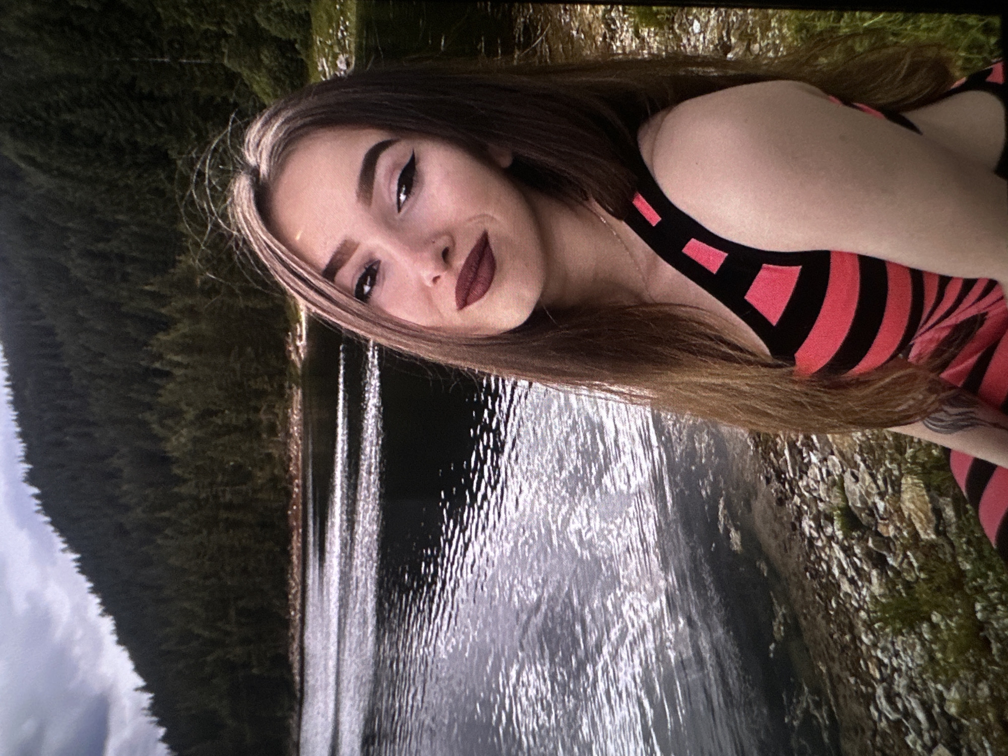 Lakeside selfie and parked car on Bulgarian hillside