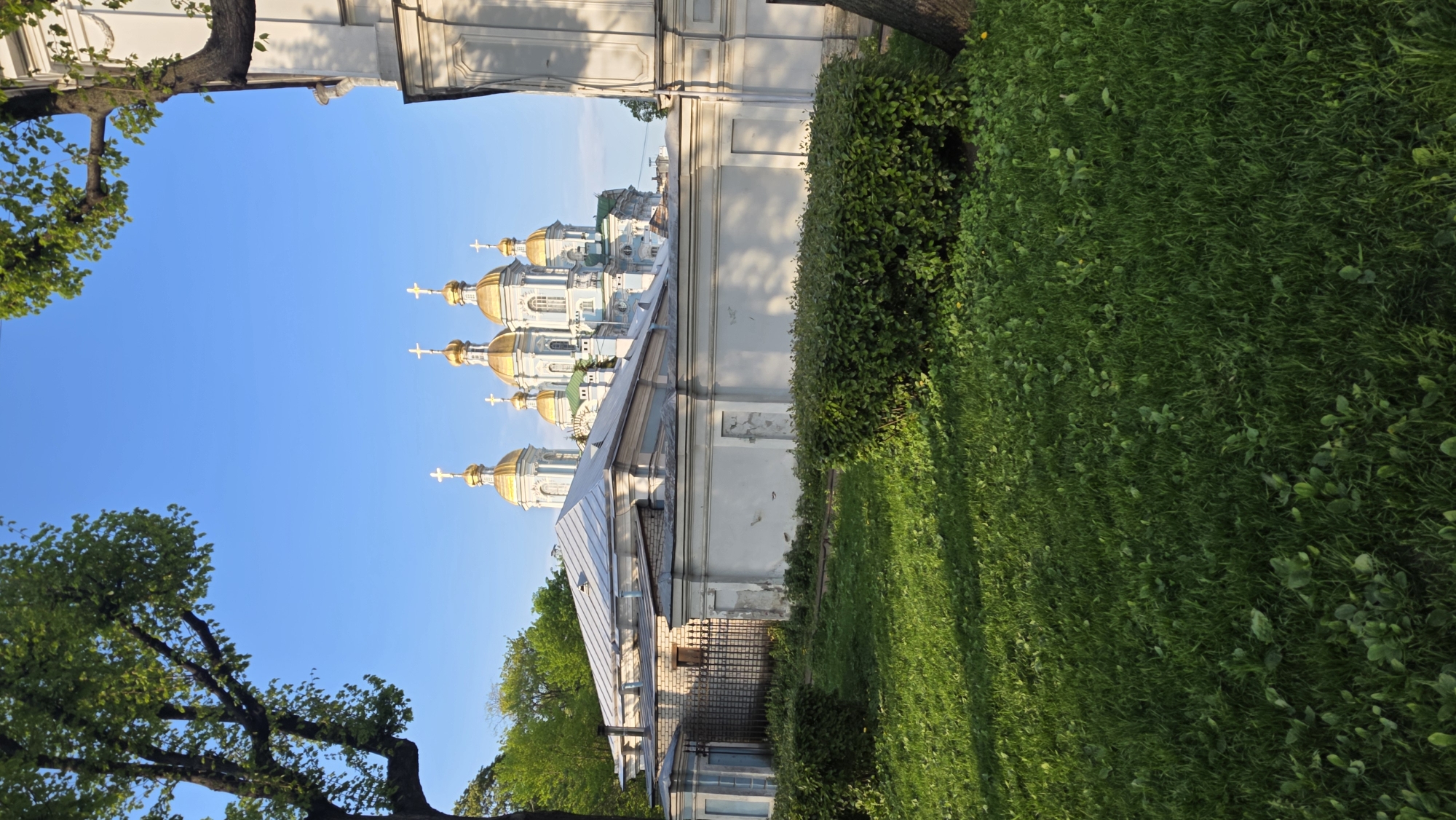 Tourist captures Saint Petersburg's iconic cathedrals during afternoon walkabout