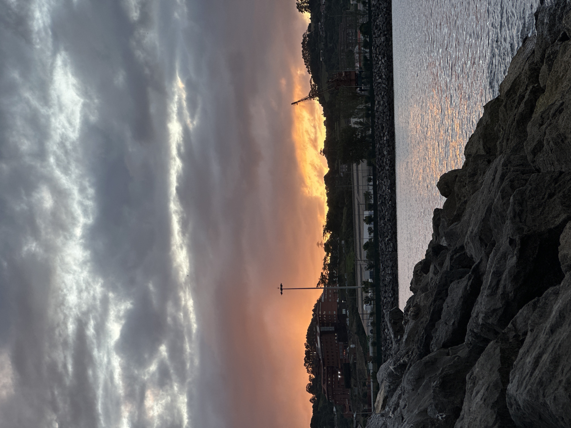 Sunset captured at Gijón harbor waterfront, Spain
