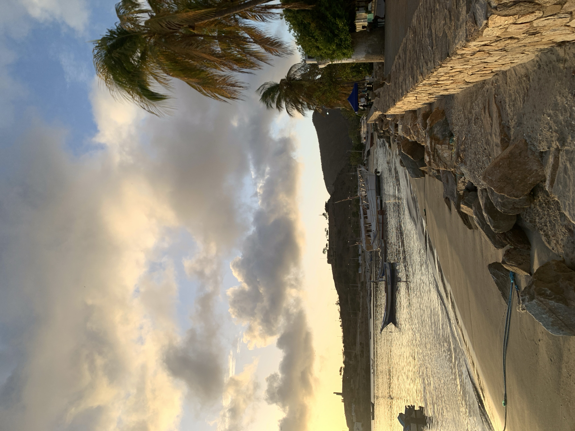 Sunset over Juan Griego bay and streets below