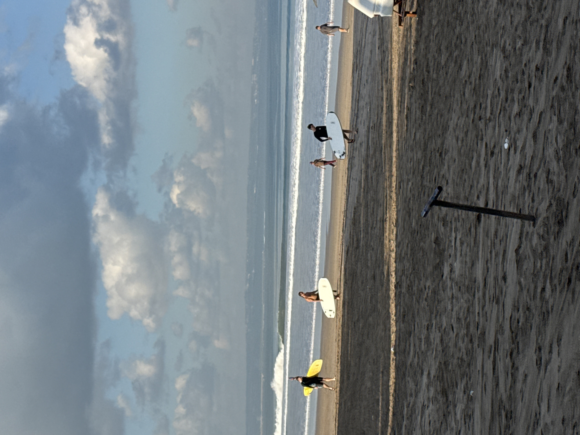 Daily life scenes documented across Kuta beaches and streets