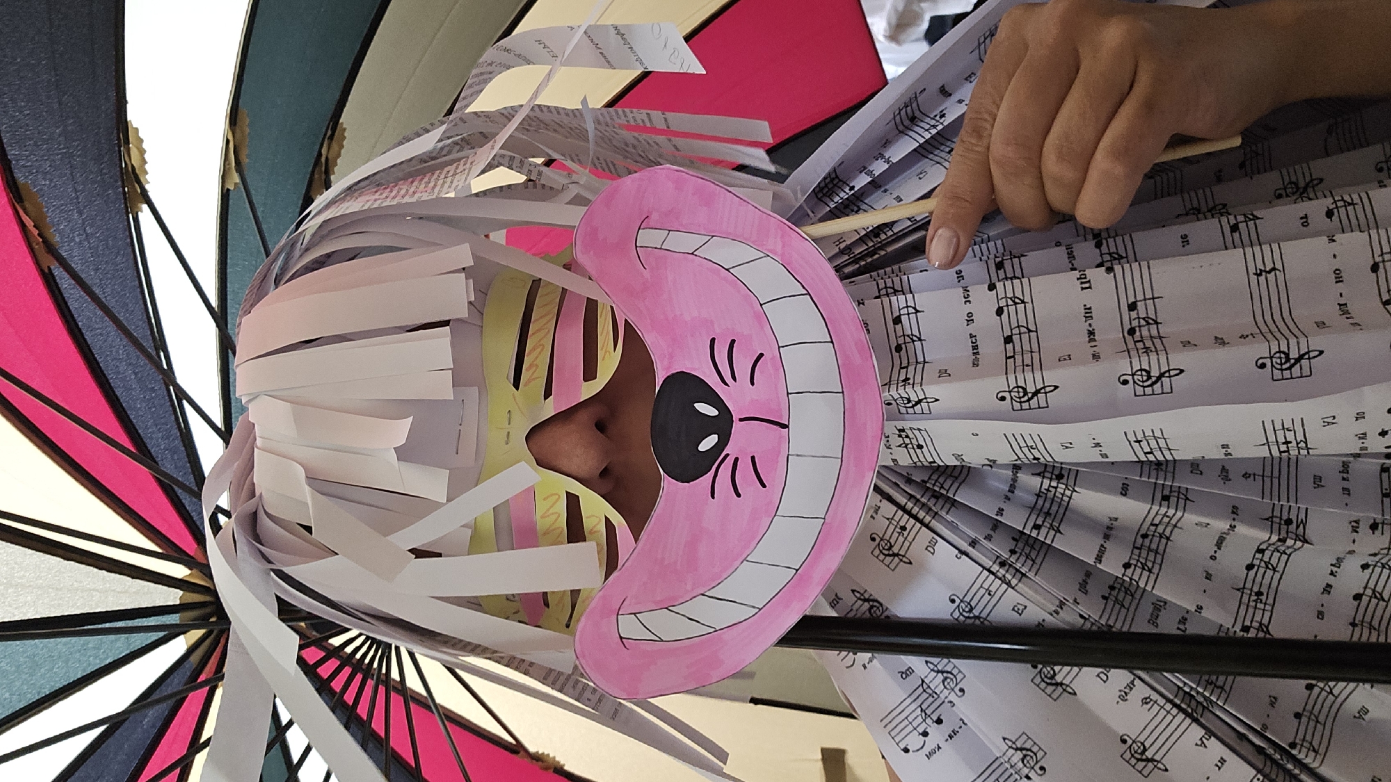 Costumed individuals spotted in handmade masks and paper accessories